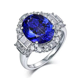 18Kt White Gold 5.265 ct Tanzanite Ring with Diamonds (Unisex)