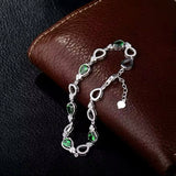 18Kt White Gold Tsavorite 1.35 ct Bracelet with Diamonds 0.75 ct