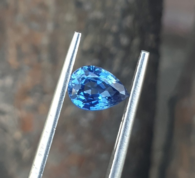 Natural blue sapphire, 1.13 carats, pear mixed cut, transparent blue color, heated, IGI certified gemstone
