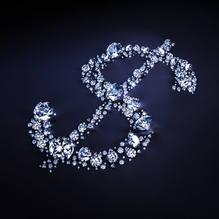 Diamonds on dark blue background in shape of dollar.