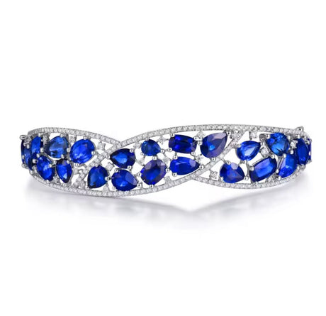 Blue Sapphire & Diamond Bangle – 18K White Gold, 14.64 g