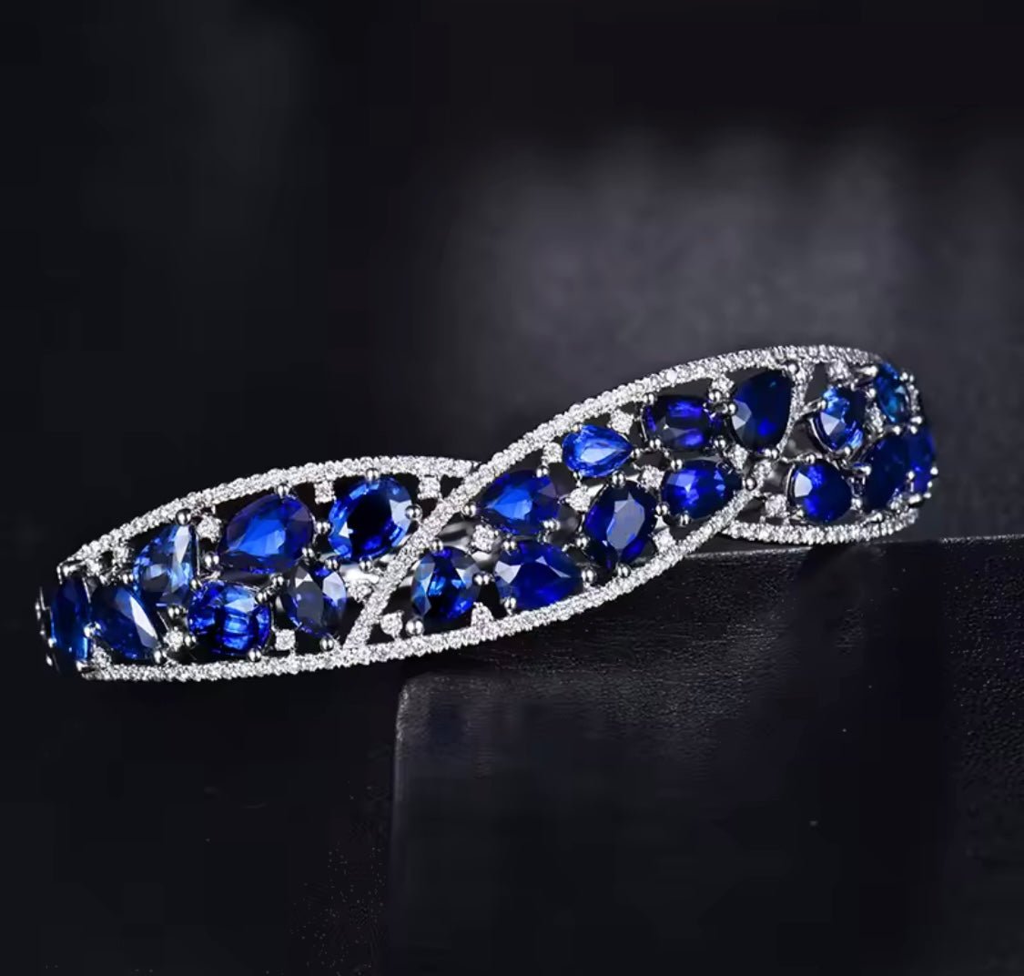 Blue Sapphire & Diamond Bangle – 18K White Gold, 14.64 g