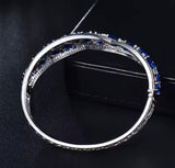 Blue Sapphire & Diamond Bangle – 18K White Gold, 14.64 g