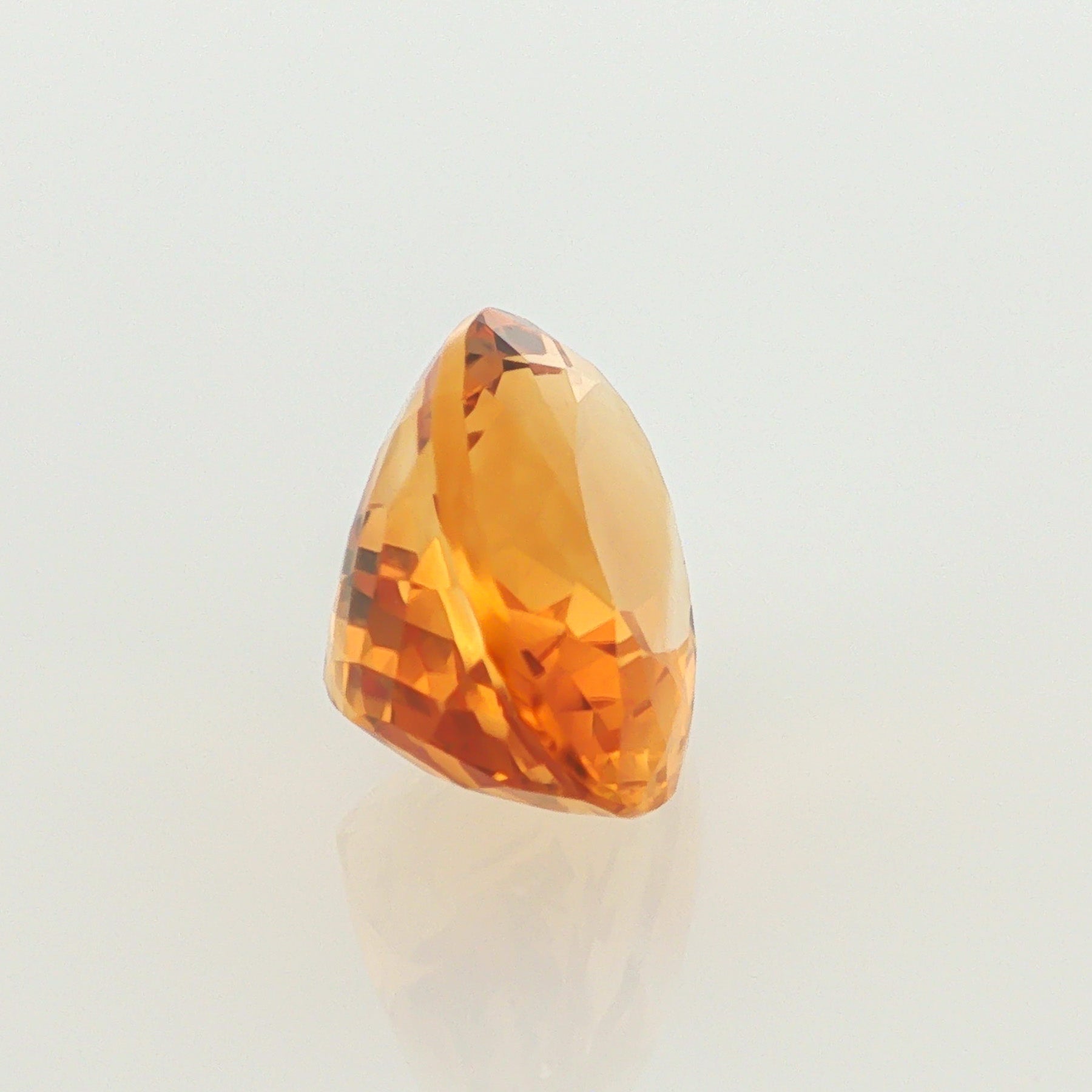 Natural heated citrine, orangy yellow, cushion cut, loose gemstone, view 2.