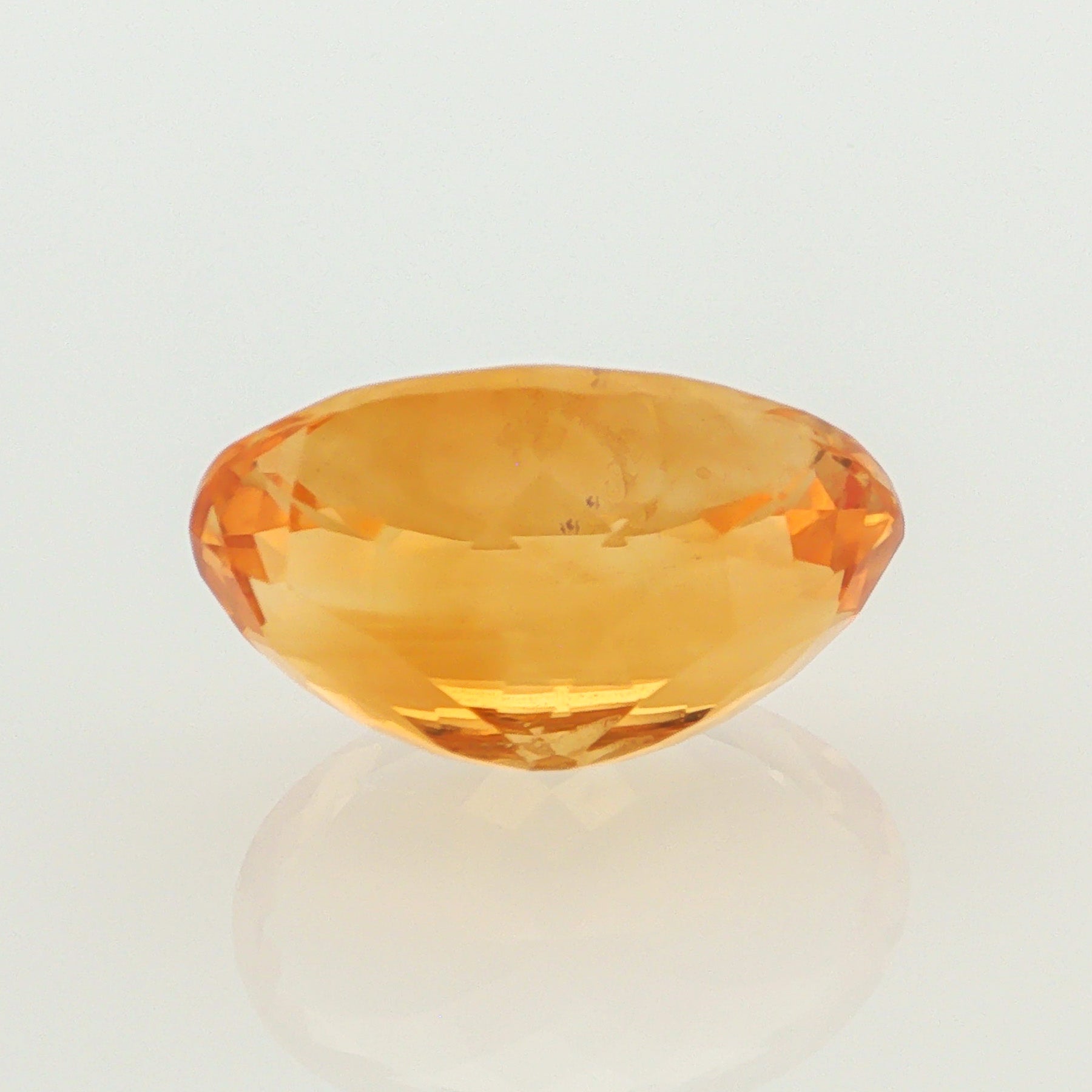 Natural heated citrine, orangy yellow, cushion cut, loose gemstone, view 3.