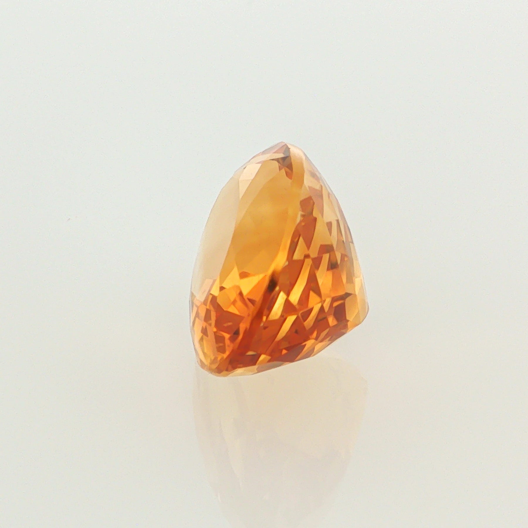 Natural heated citrine, orangy yellow, cushion cut, loose gemstone, view 4.