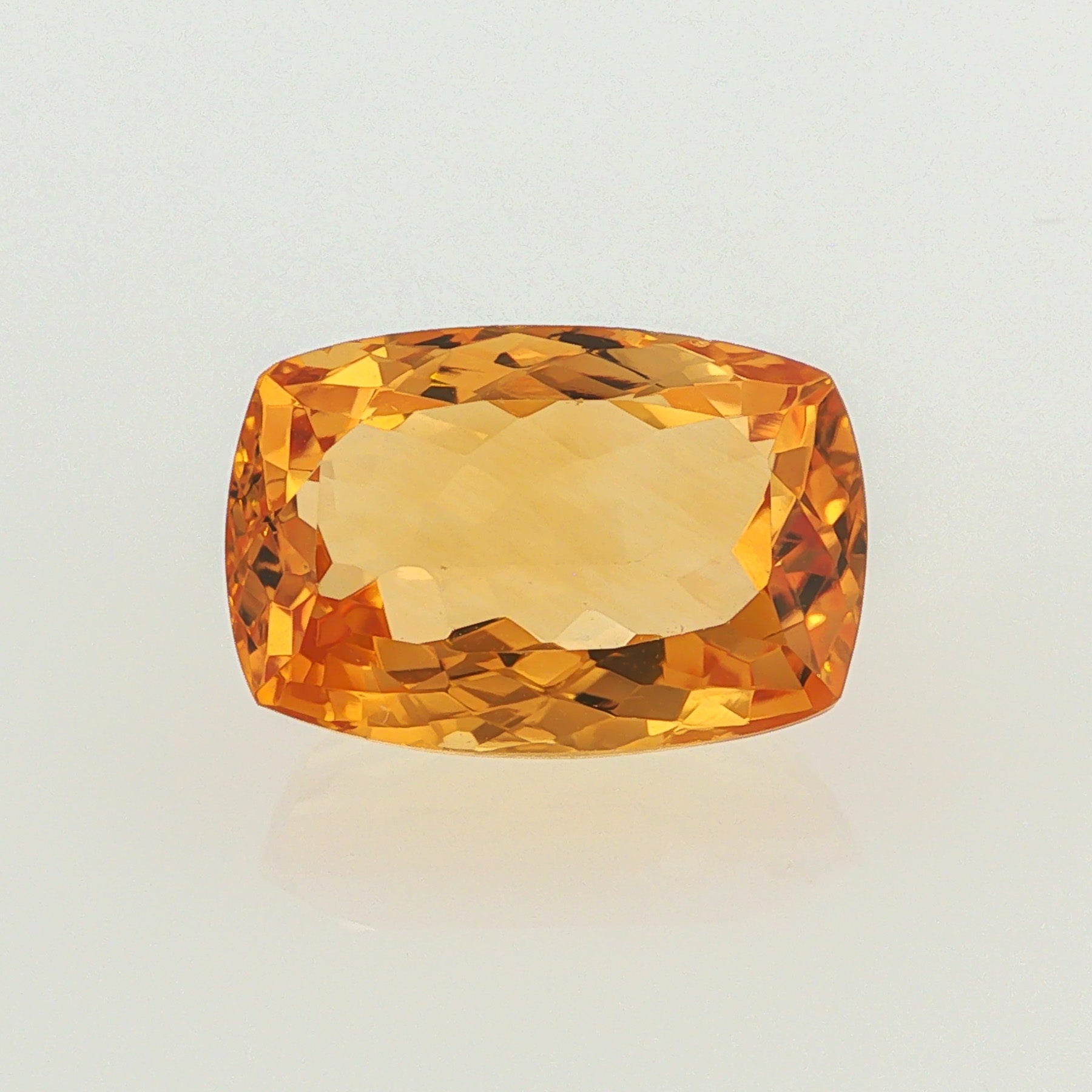 Natural heated citrine, orangy yellow, cushion cut, 12.05 ct, loose gemstone.