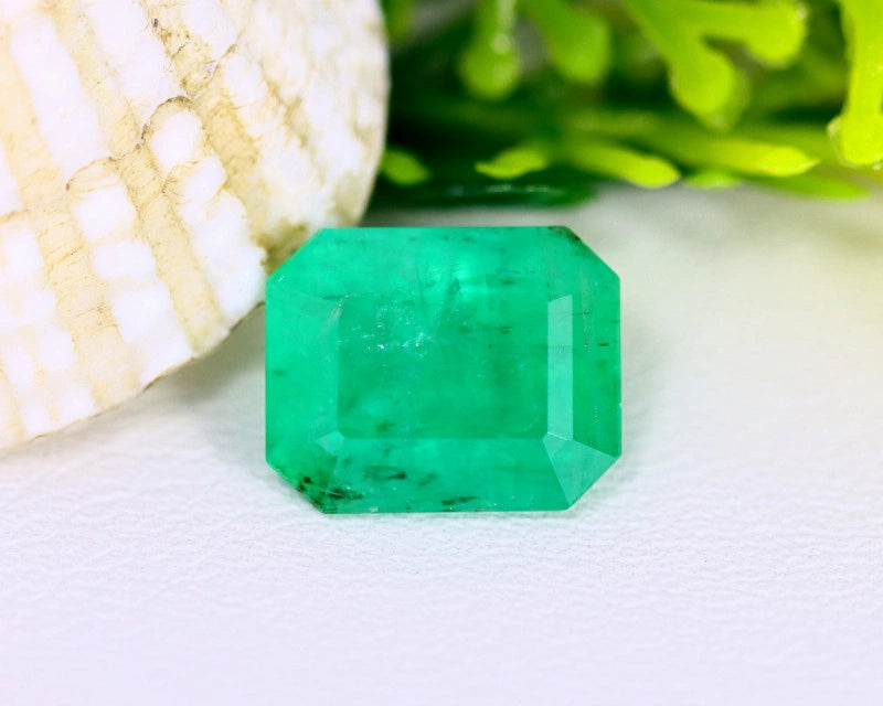 3.79 ct green emerald in oval cut from Zambia, SI clarity, treated with cedar oil