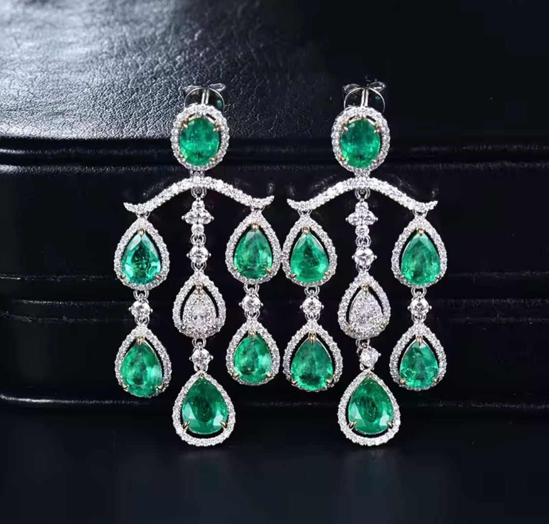 18K gold emerald diamond chandelier earrings with 4.48 carat emeralds and luxury drop design