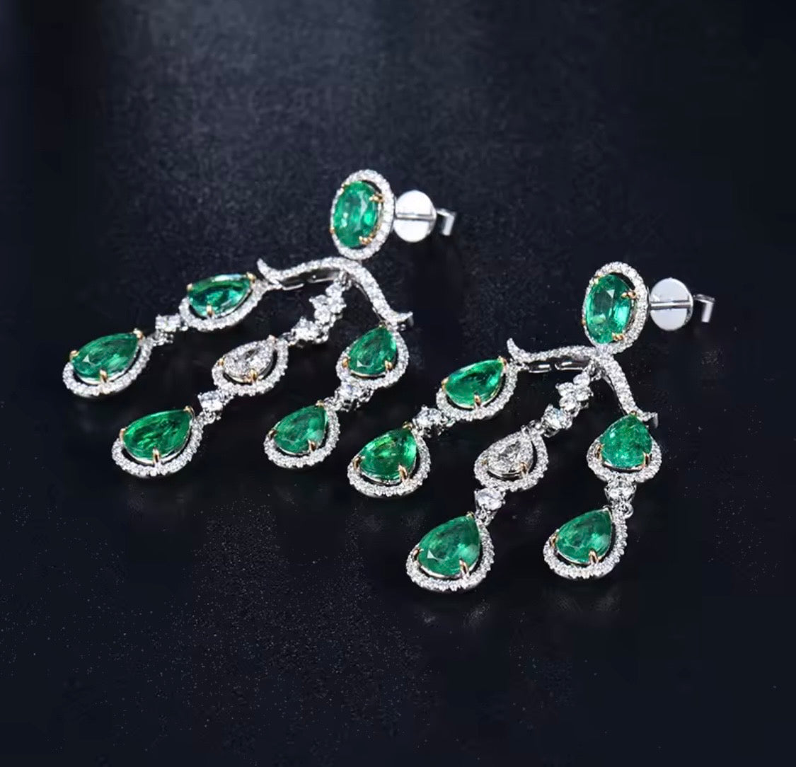 18K gold emerald diamond chandelier earrings with 4.48 carat emeralds and luxury drop design