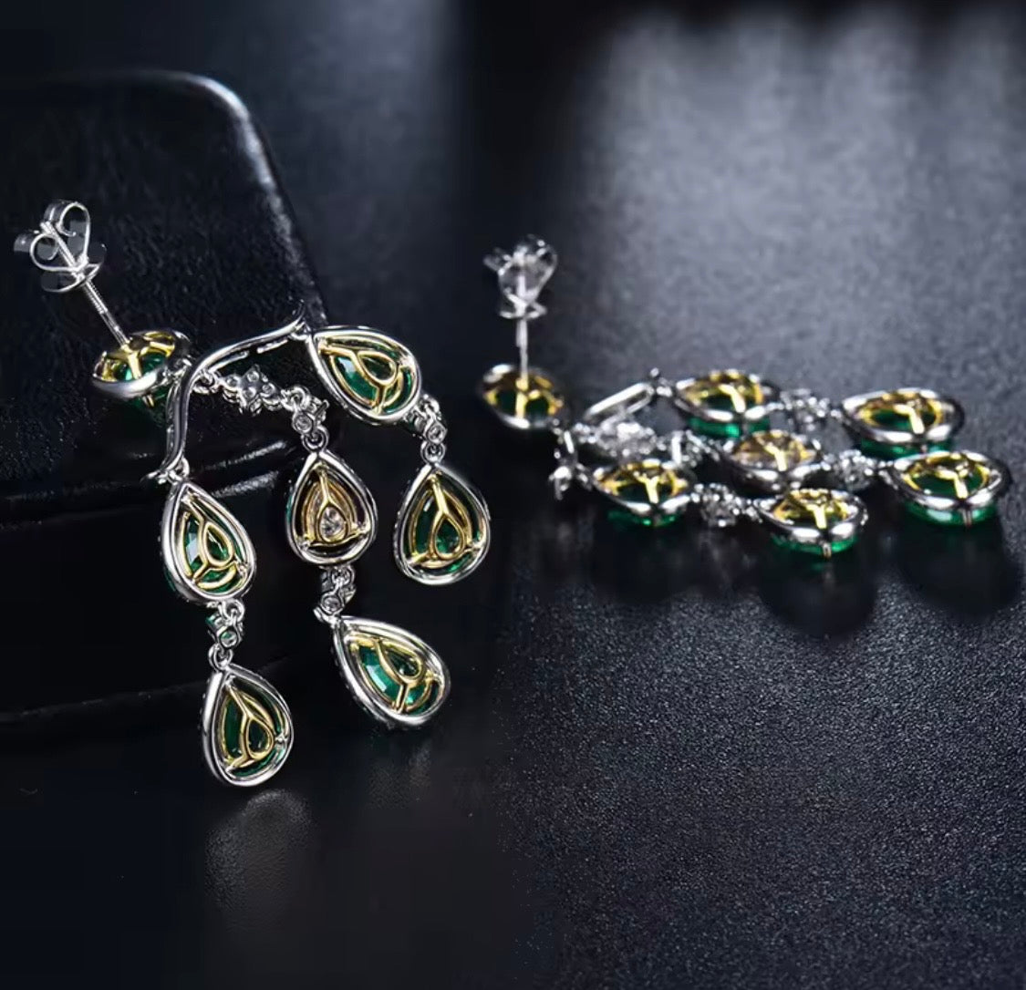 18K gold emerald diamond chandelier earrings with 4.48 carat emeralds and luxury drop design