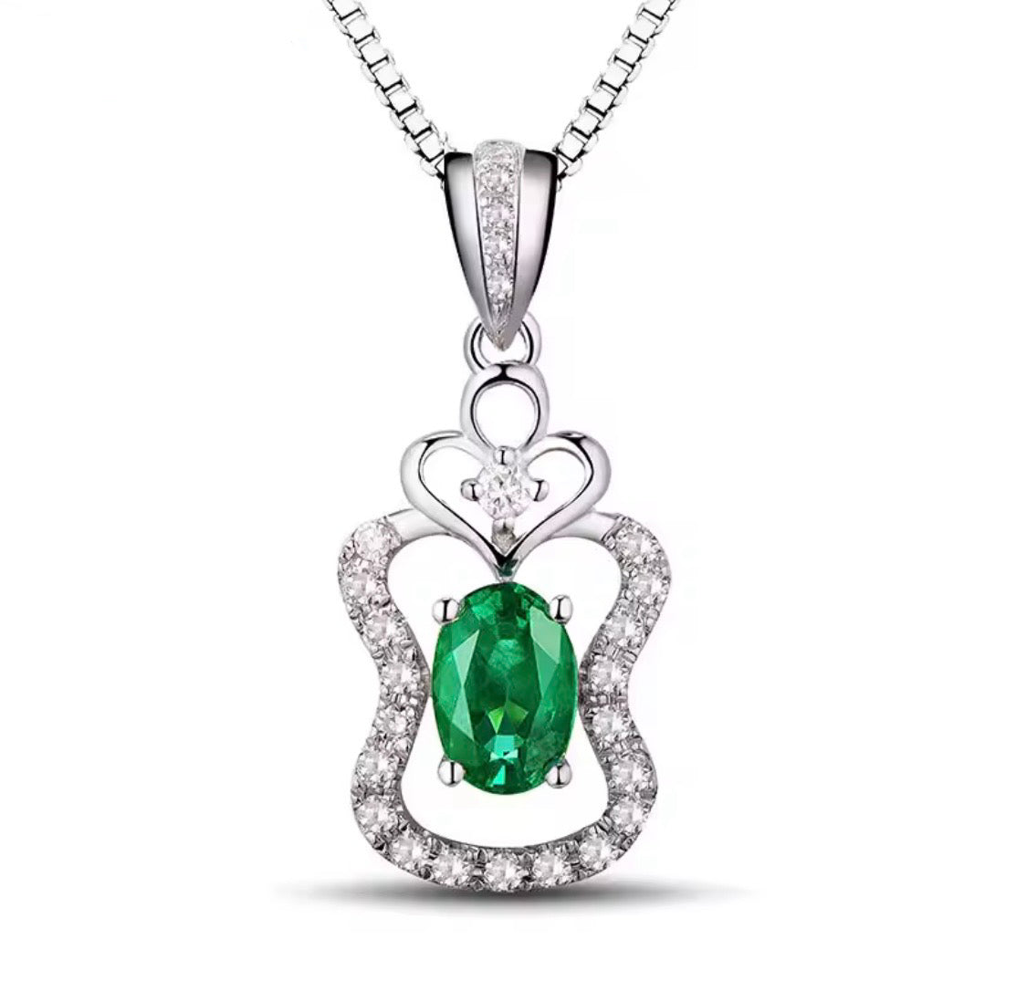 18K white gold emerald diamond pendant with 0.45 carat oval natural emerald and heart halo design