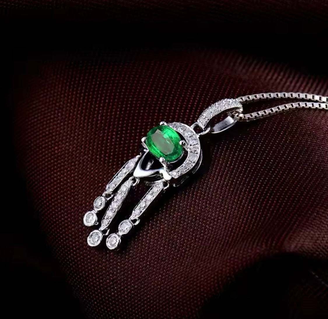 18K white gold emerald diamond pendant with oval natural emerald and geometric drop design