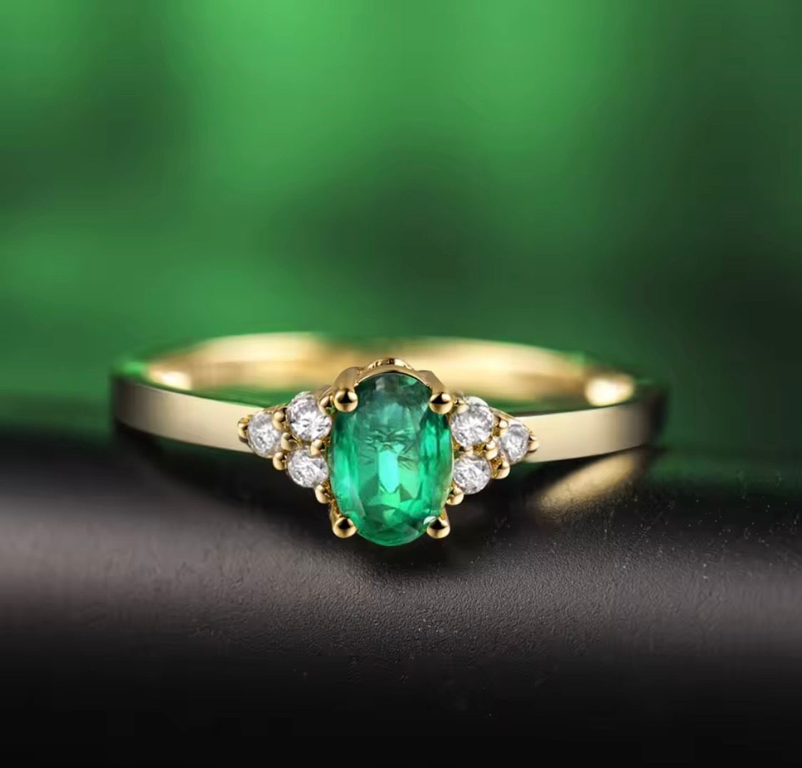 18K yellow gold emerald diamond ring with 0.50 carat oval natural emerald and diamond accents