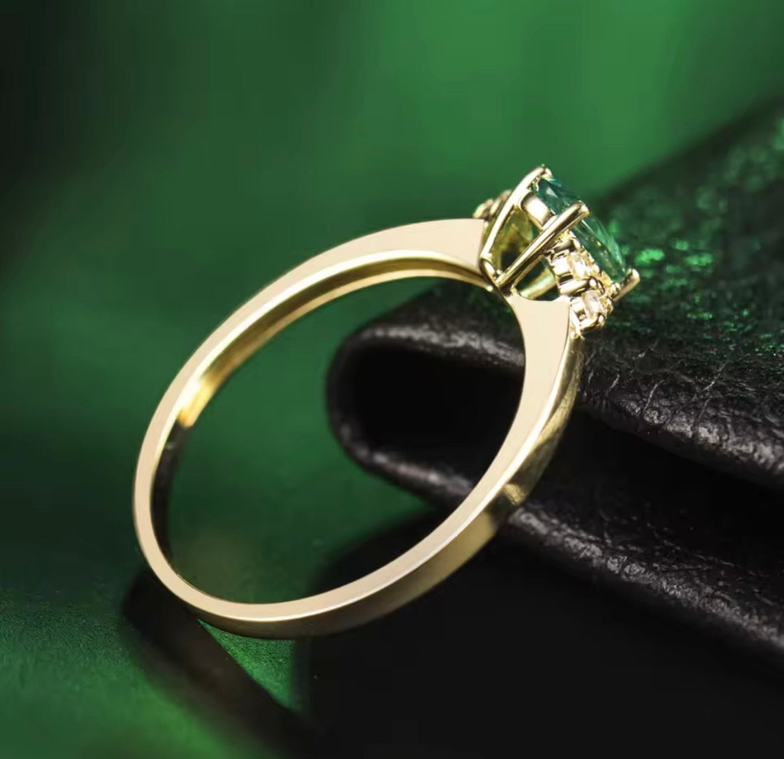 18K yellow gold emerald diamond ring with 0.50 carat oval natural emerald and diamond accents