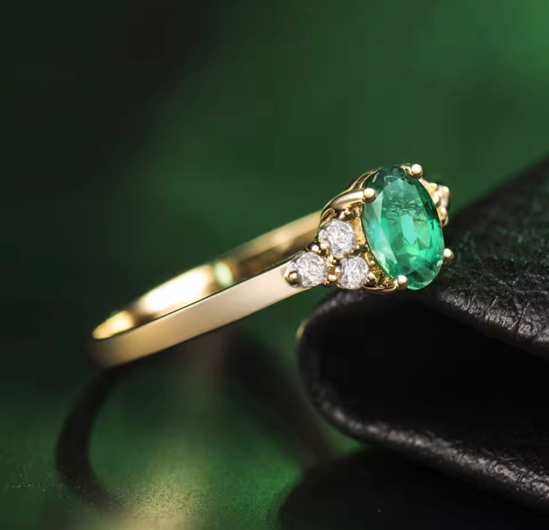 18K yellow gold emerald diamond ring with 0.50 carat oval natural emerald and diamond accents