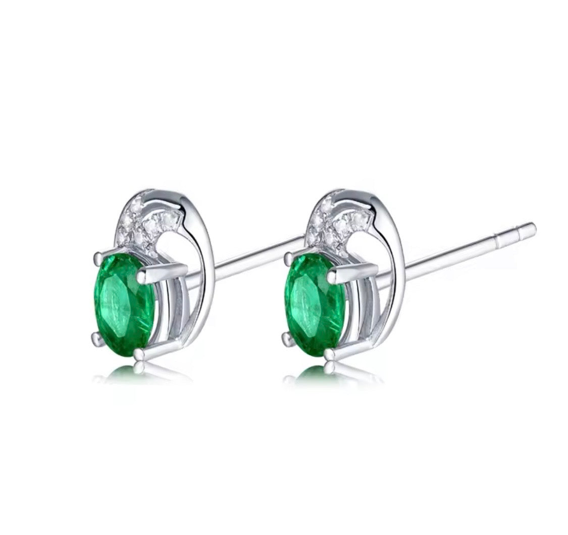 18K gold emerald stud earrings with oval 4x5mm gemstones and vintage swirl design