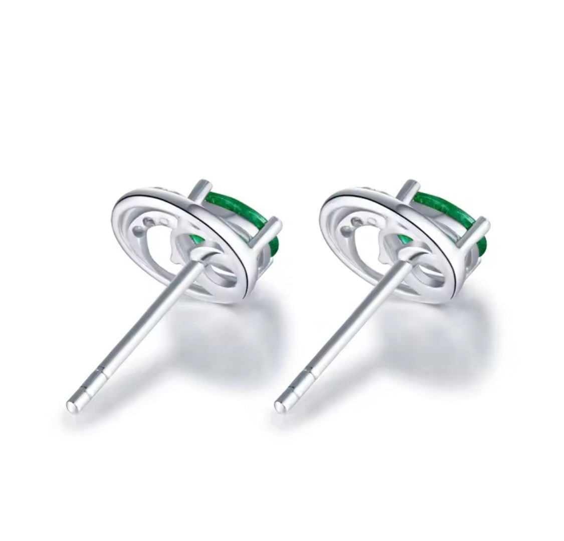 18K gold emerald stud earrings with oval 4x5mm gemstones and vintage swirl design