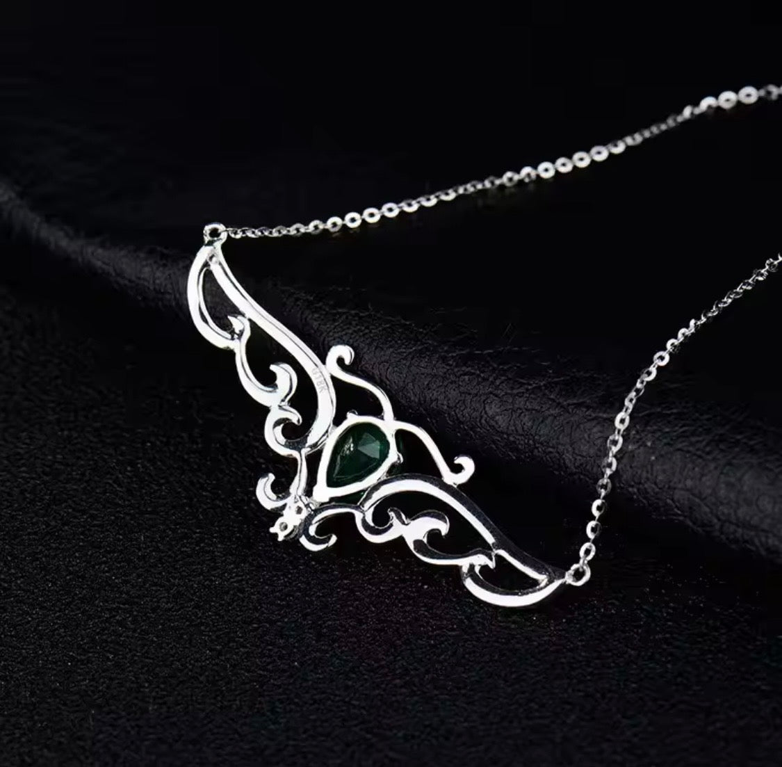 18K gold emerald diamond pendant with 0.66 carat pear cut natural emerald and angel wings design