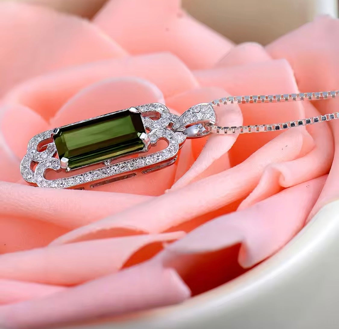14K gold green tourmaline pendant with 2.05 carat emerald cut gemstone and diamond frame
