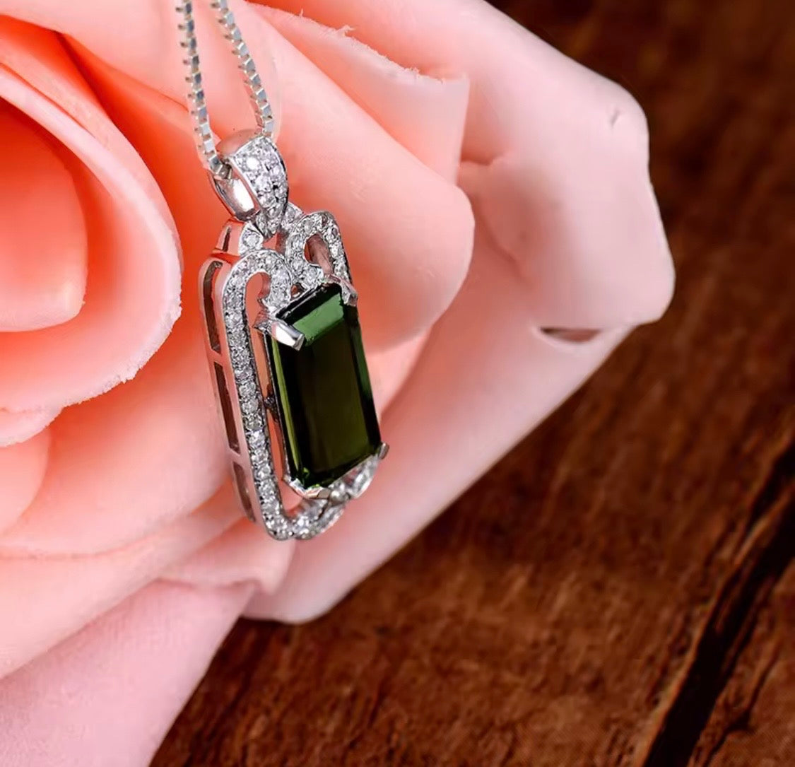 14K gold green tourmaline pendant with 2.05 carat emerald cut gemstone and diamond frame