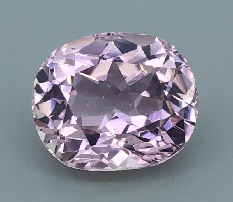 Kunzite 21.61 ct – Light Pink, Oval Cut, HGTL Certified