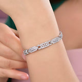 Luxury 14K white gold bracelet, 2.06 carats natural diamonds, round and emerald cut, geometric design