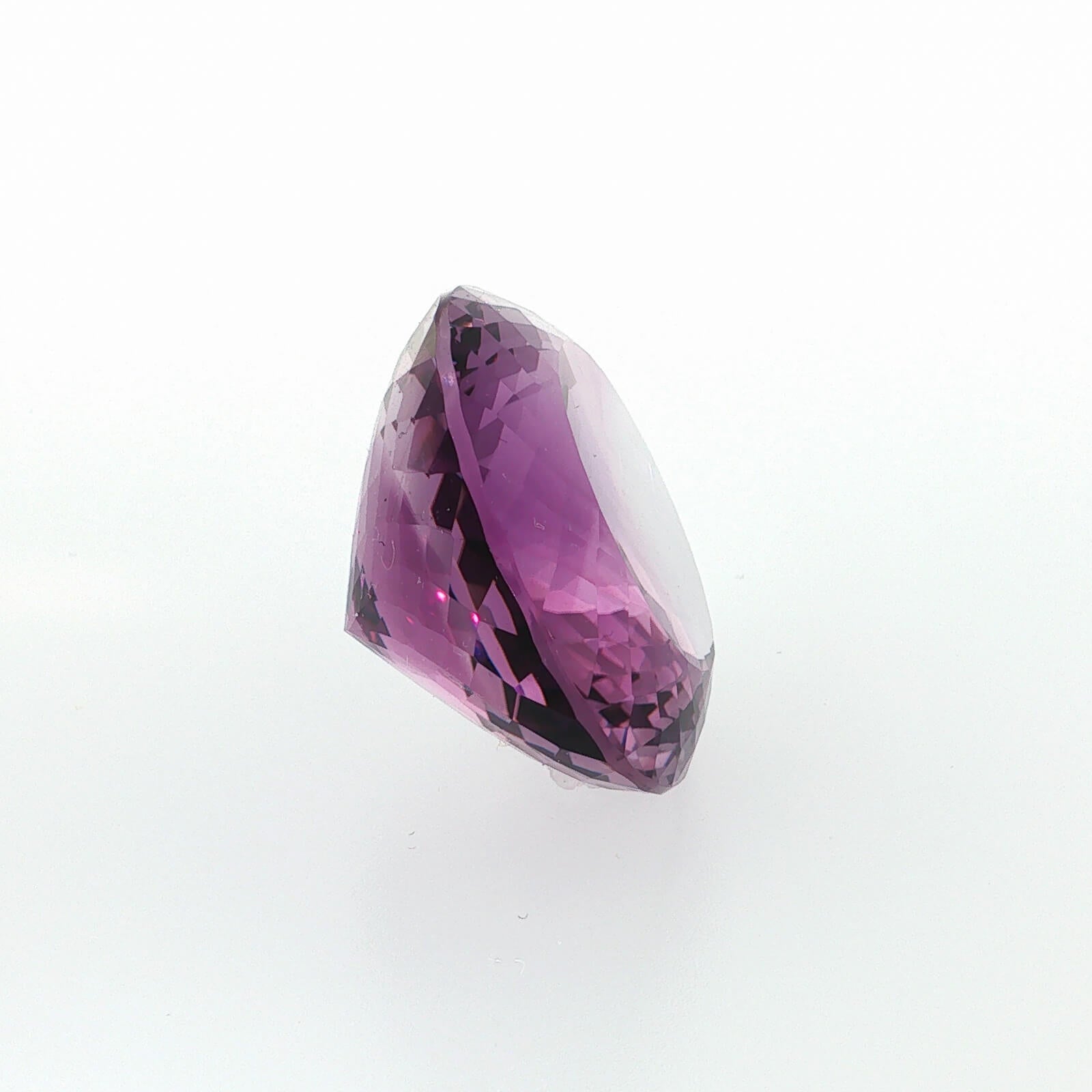 Natural amethyst, 106.80 carats, oval cut, clarity: eye clean, purple color, measuring 35.65 × 29.53 × 17.48 mm