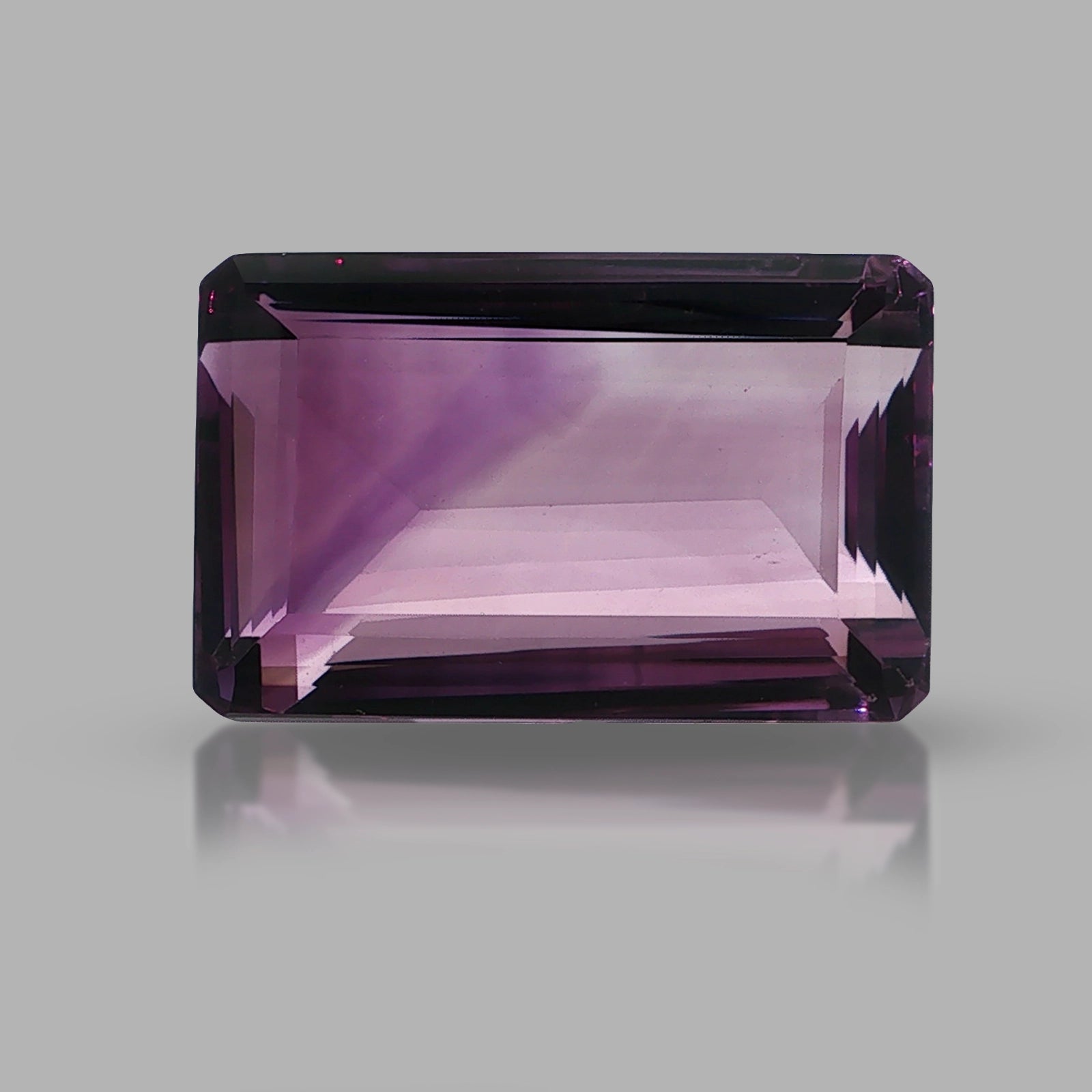 Natural amethyst, 144.05 carats, emerald cut, clarity: eye clean, purple color, measuring 36.80 × 23.60 × 17.48 mm
