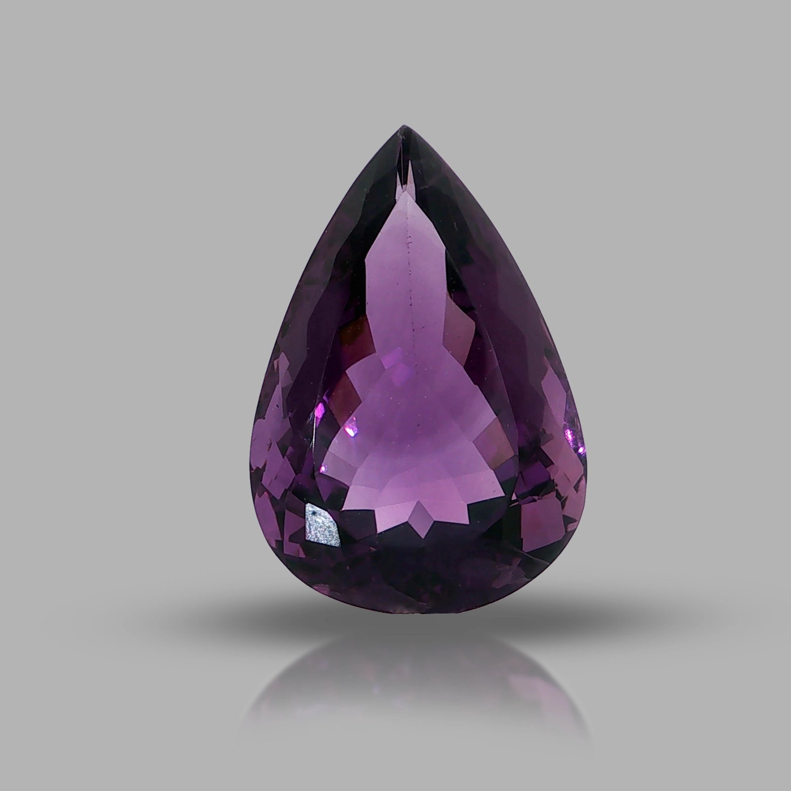 Natural amethyst, 26.49 carats, pear cut, clarity: eye clean, rich purple color, measuring 26.24 × 18.05 × 11.27 mm