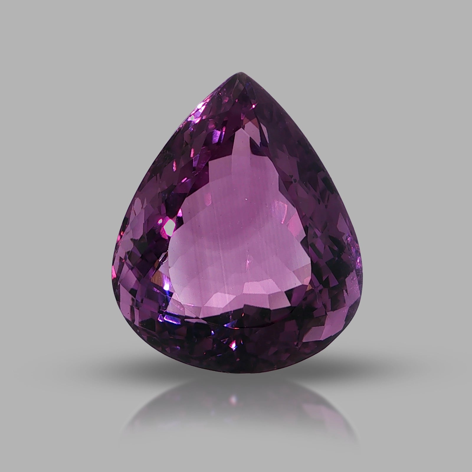 Natural amethyst, 40.07 carats, pear cut, clarity: eye clean, vibrant purple color, measuring 25.39 × 21.24 × 13.74 mm
