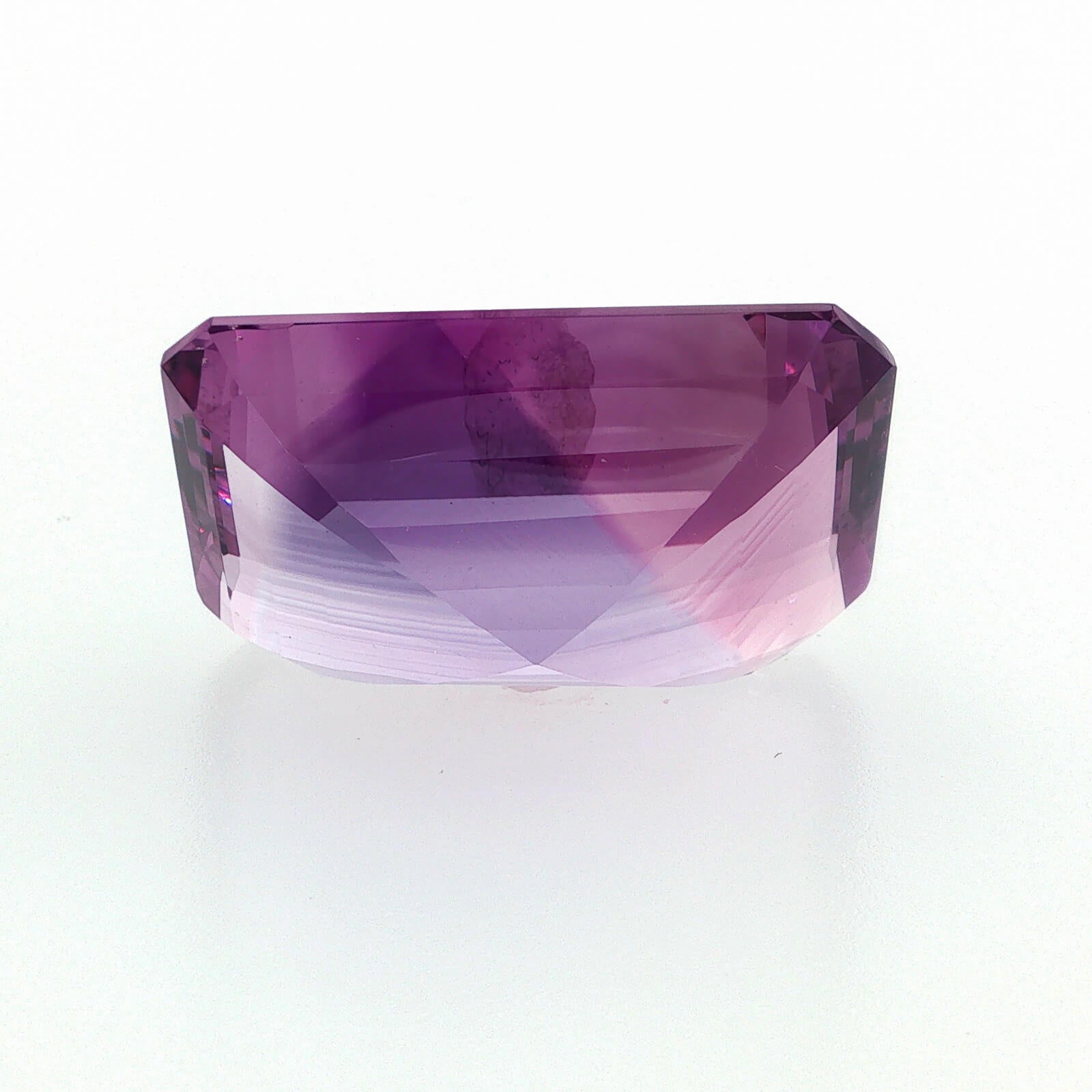 Natural amethyst, 48.46 carats, emerald cut, clarity: eye clean, purple color, measuring 28.08 × 18.83 × 12.63 mm