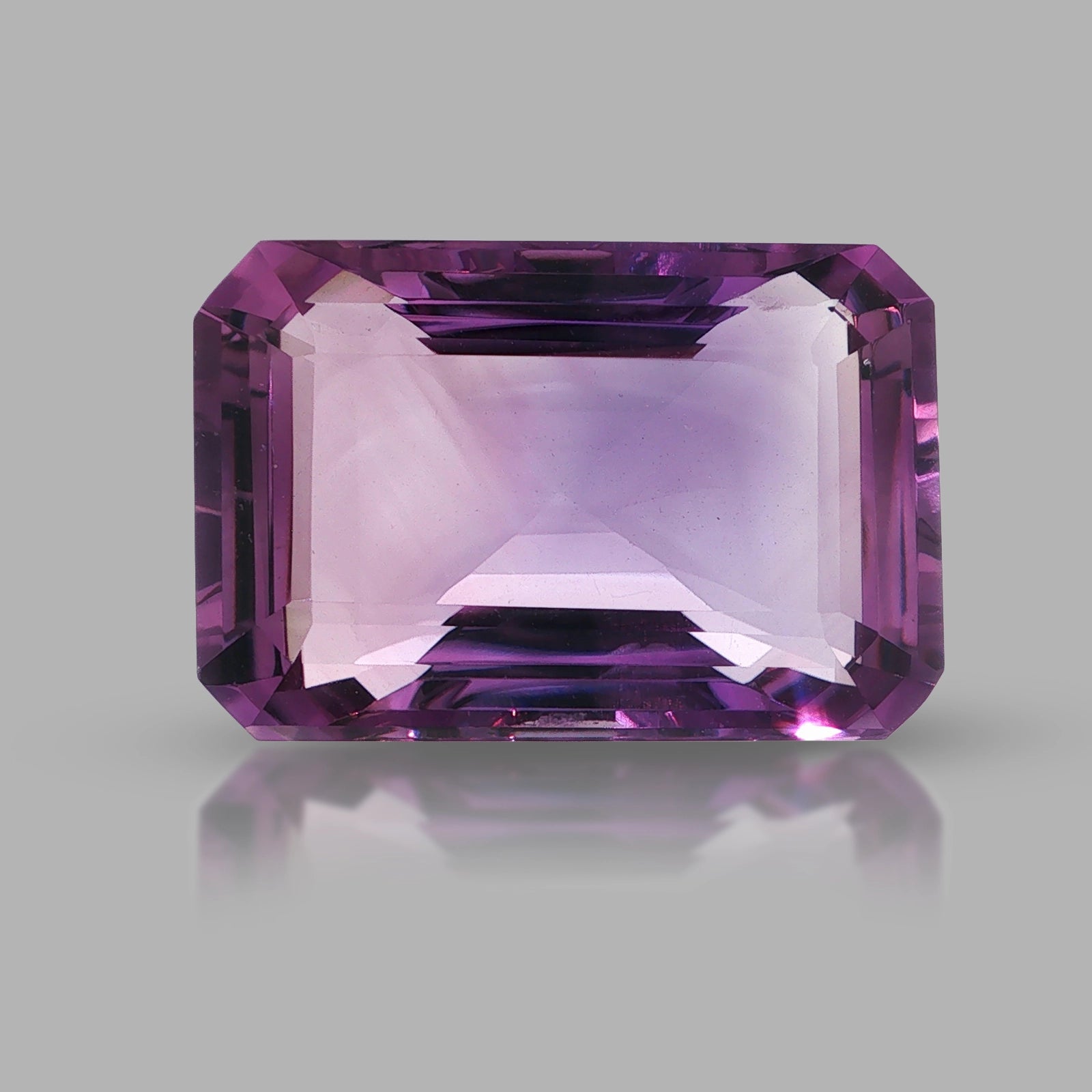 Natural amethyst, 48.46 carats, emerald cut, clarity: eye clean, purple color, measuring 28.08 × 18.83 × 12.63 mm