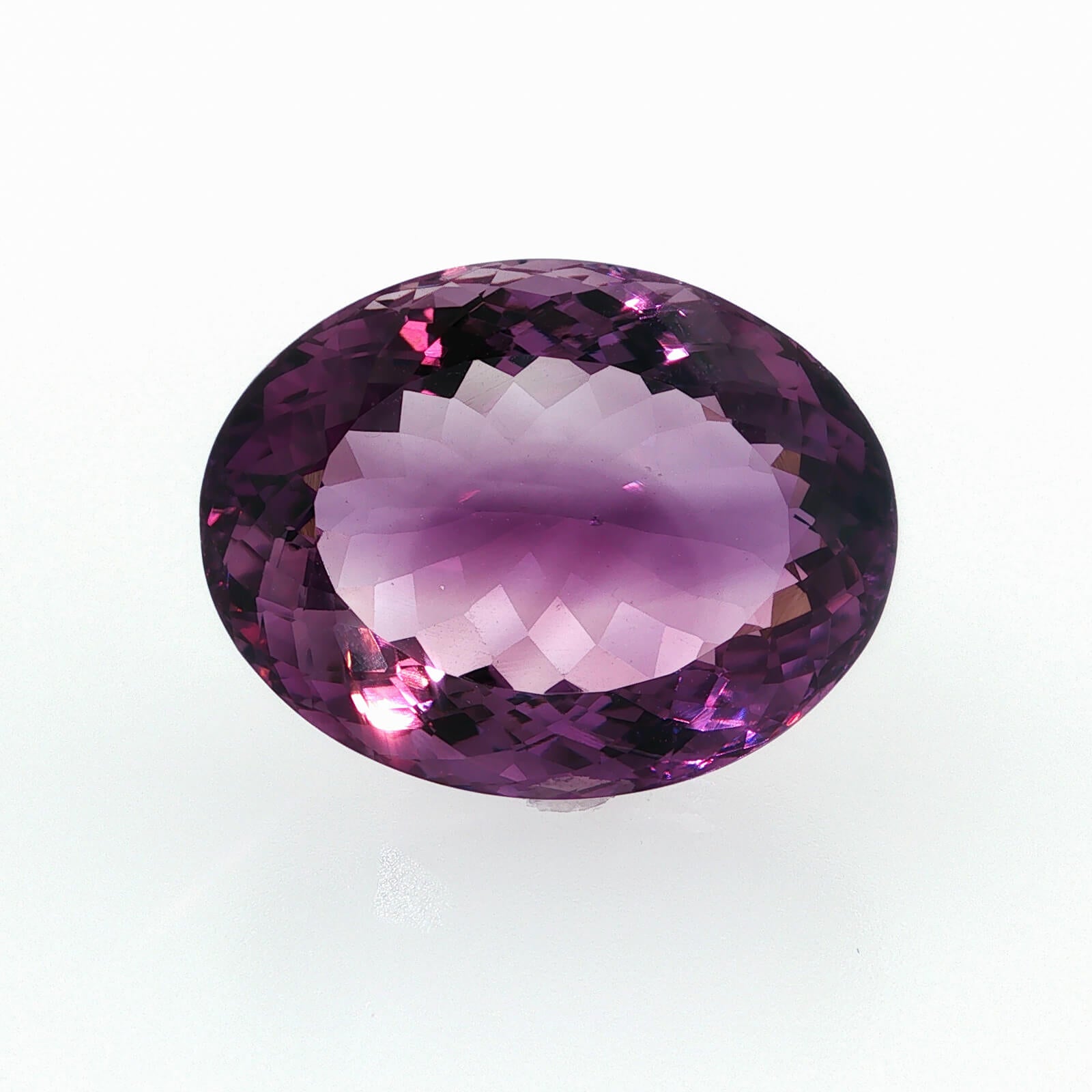 Natural amethyst, 53.78 carats, oval cut, clarity: eye clean, rich purple color, measuring 28.32 × 21.93 × 14.54 mm
