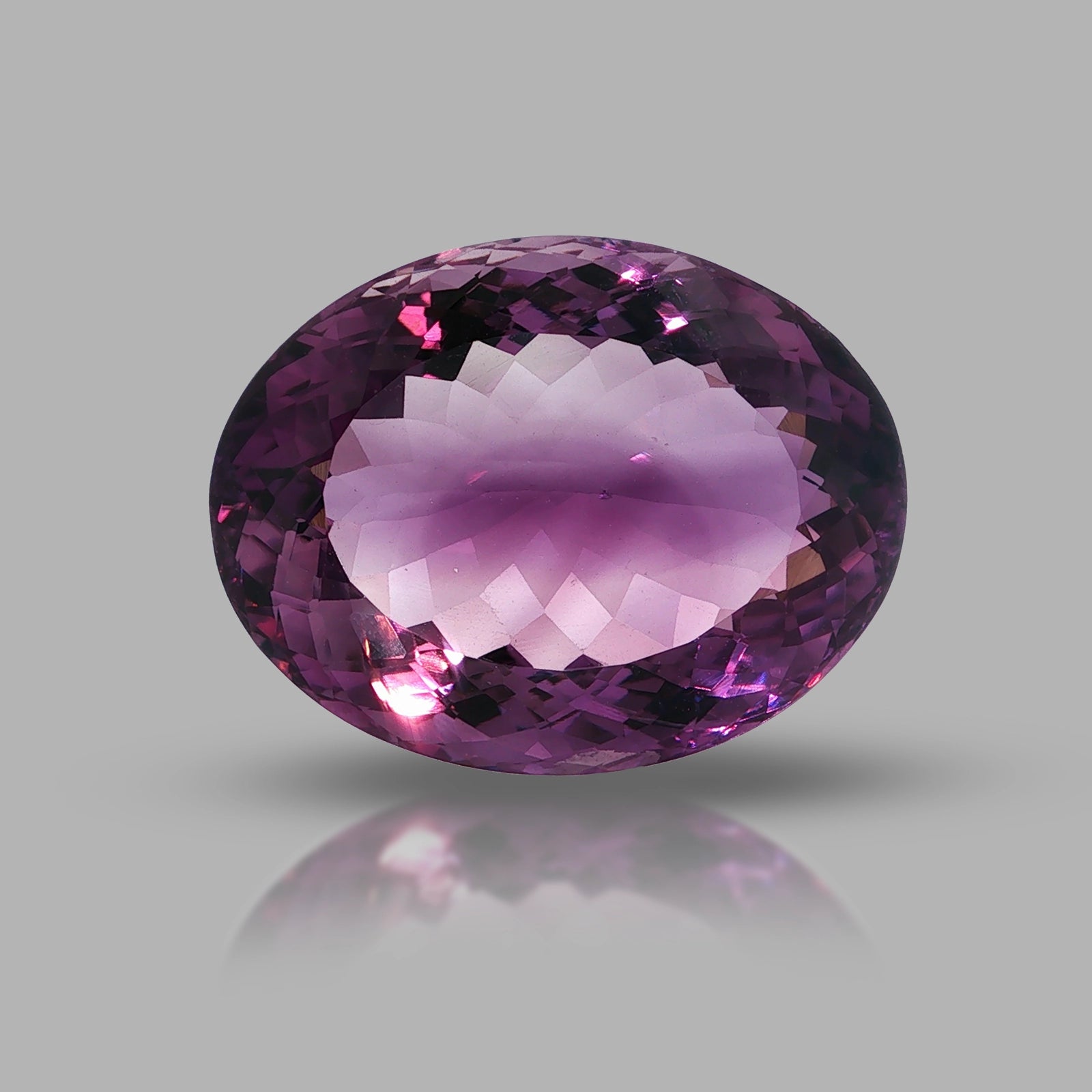 Natural amethyst, 53.78 carats, oval cut, clarity: eye clean, rich purple color, measuring 28.32 × 21.93 × 14.54 mm