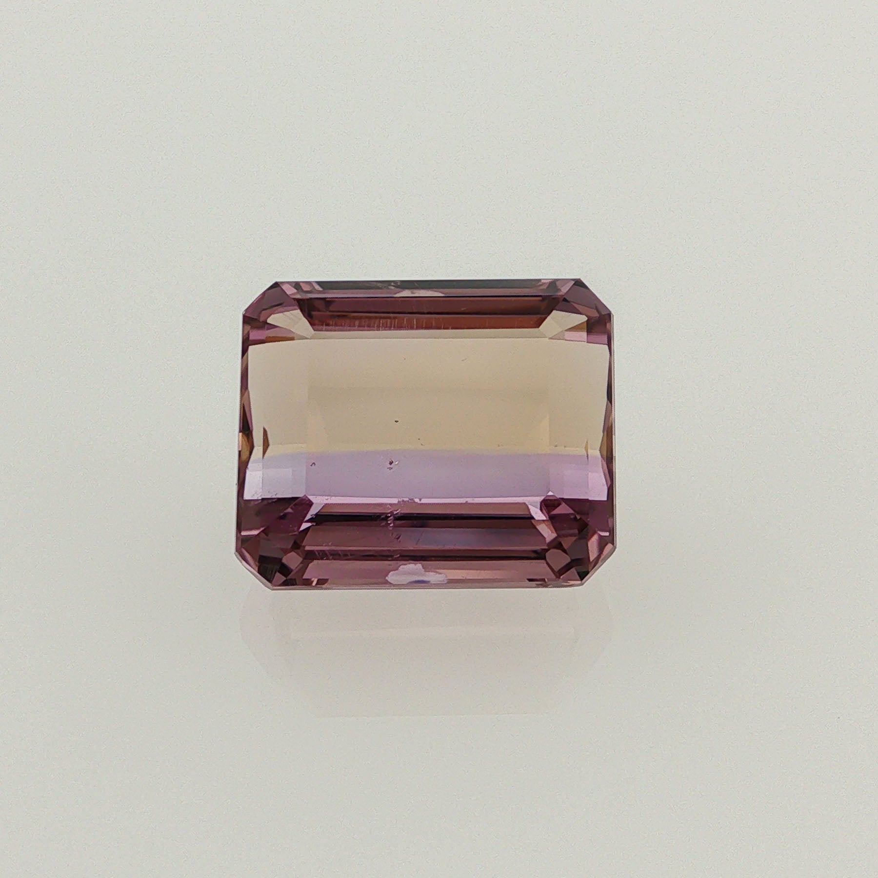 Natural ametrine, bicolor - purple / yellow, emerald cut, 10.13 ct, loose gemstone.