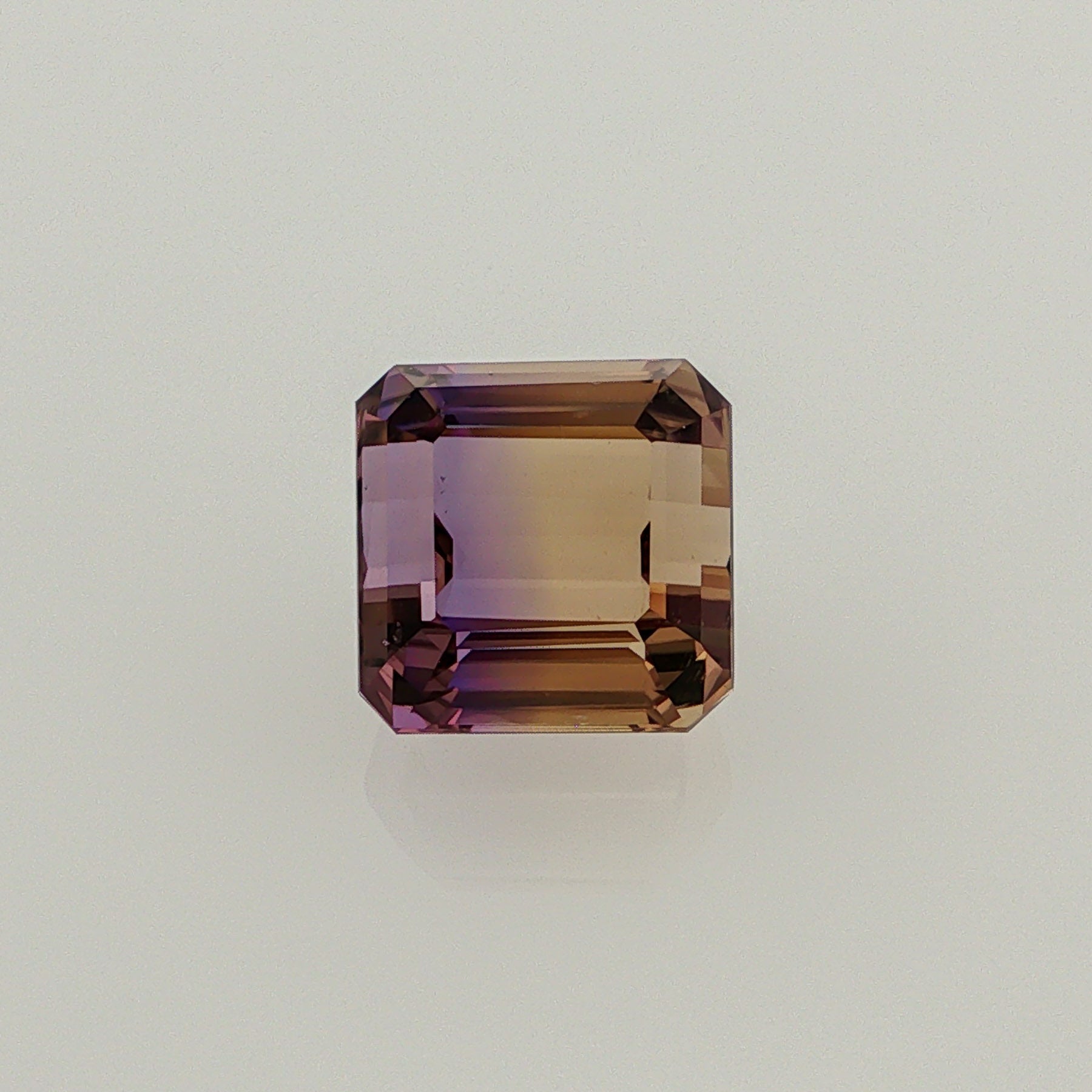 Natural ametrine, bicolor - purple / yellow, octagon cut, 10.41 ct, loose gemstone.