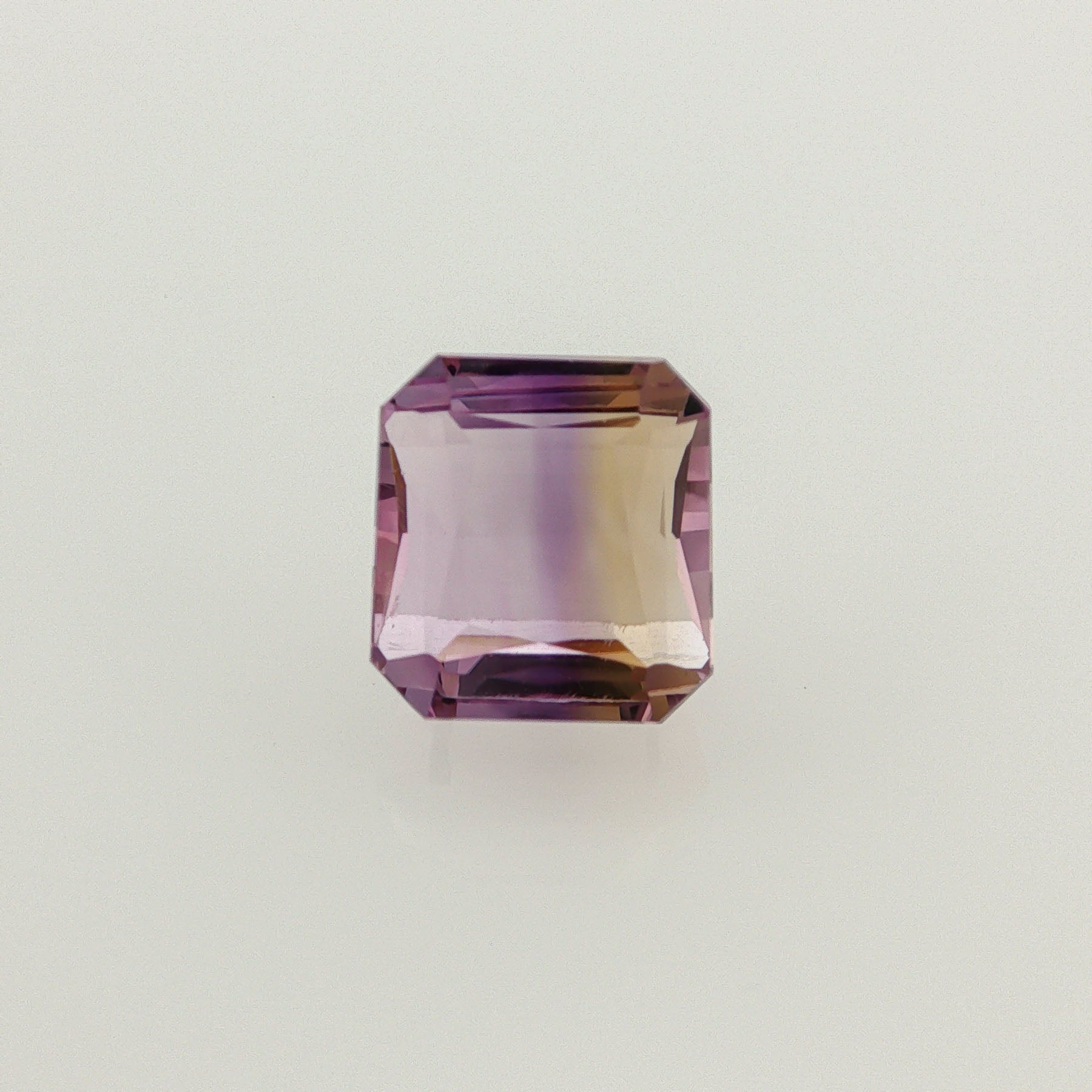 Natural ametrine, bicolor - purple / yellow, octagon cut, 10.44 ct, loose gemstone.