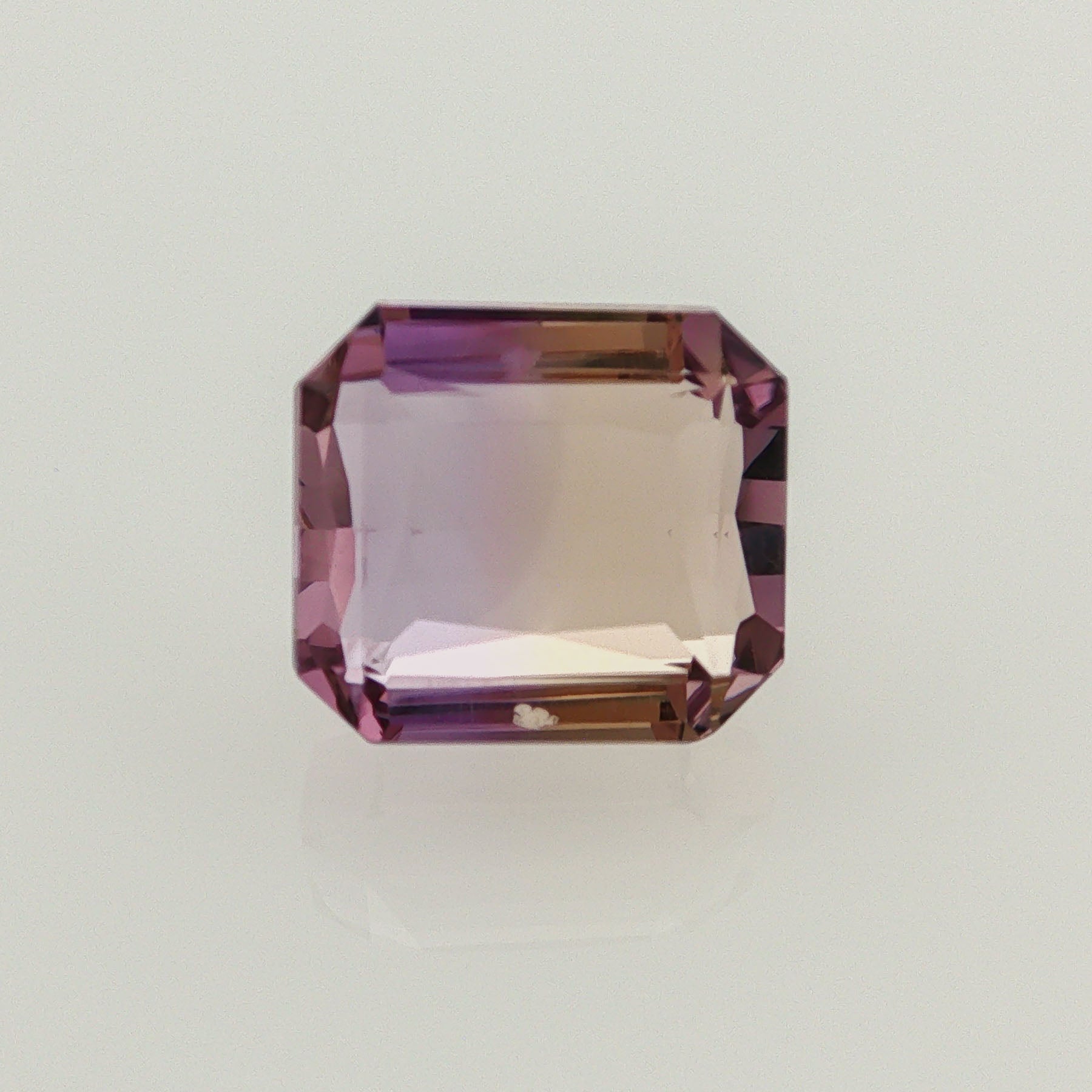 Natural ametrine, bicolor - purple / yellow, octagon cut, 10.44 ct, loose gemstone.