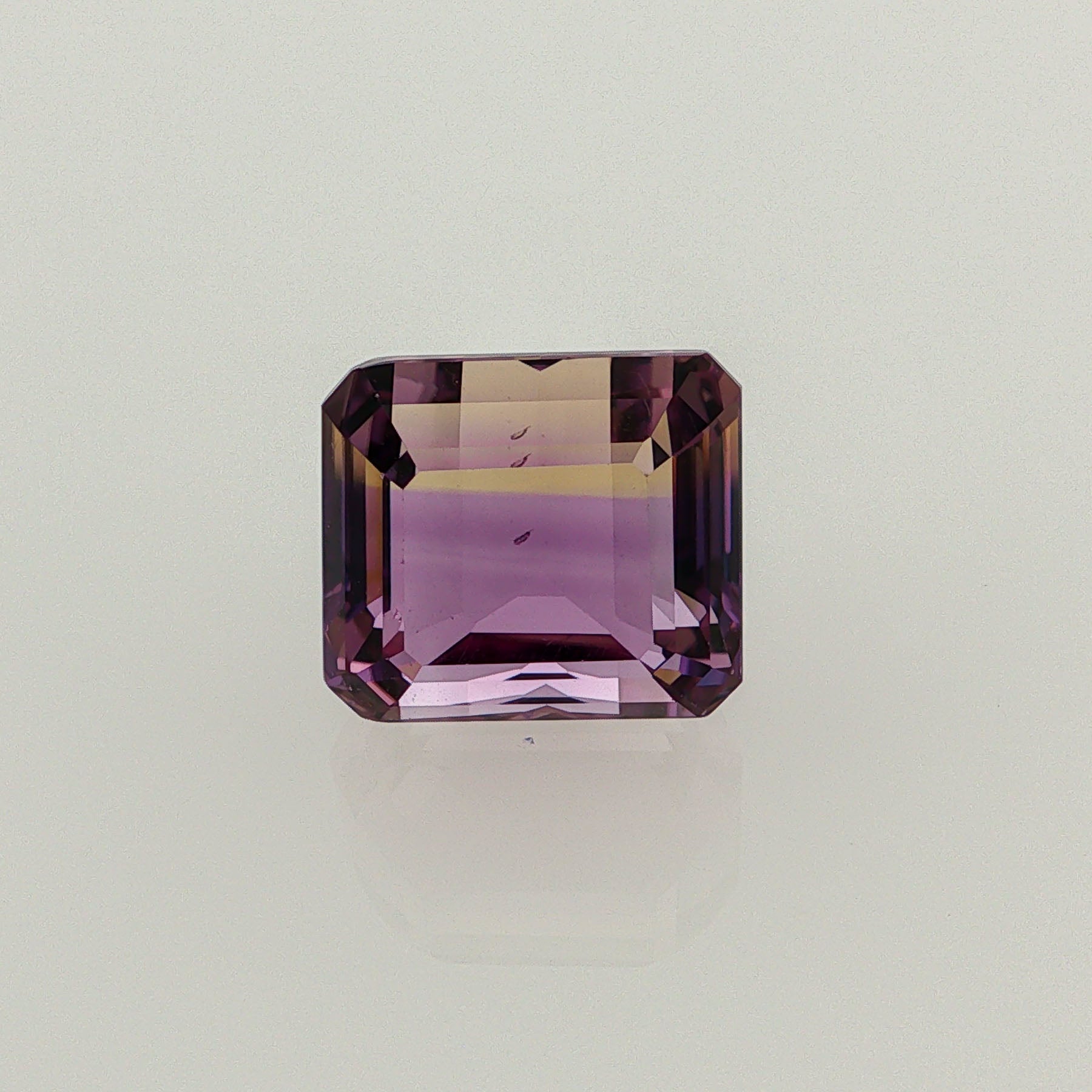 Natural ametrine, bicolor - vivid purple / light yellow, octagon cut, 10.71 ct, loose gemstone.