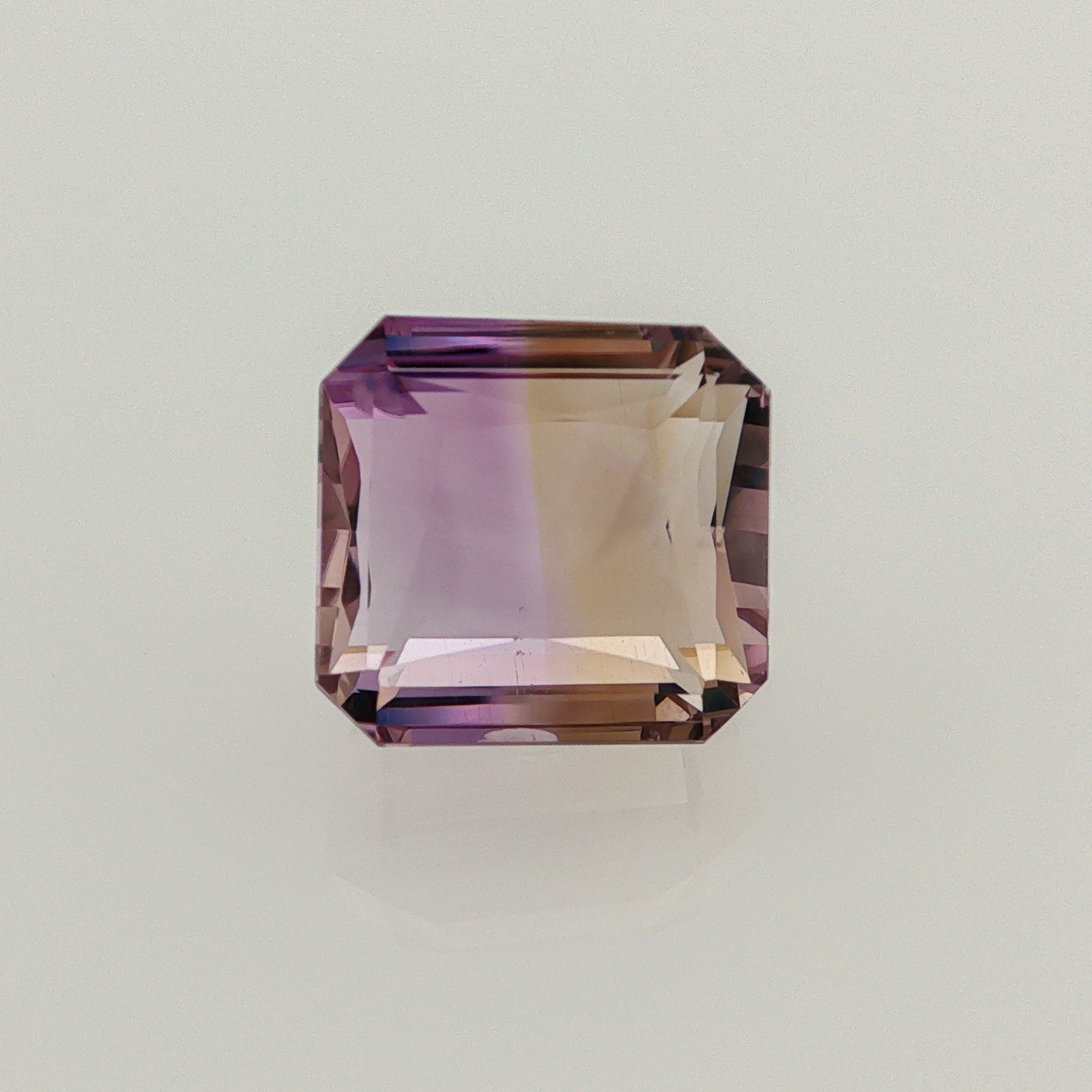 Natural ametrine, bicolor - purple / yellow, octagon cut, 10.85 ct, loose gemstone.