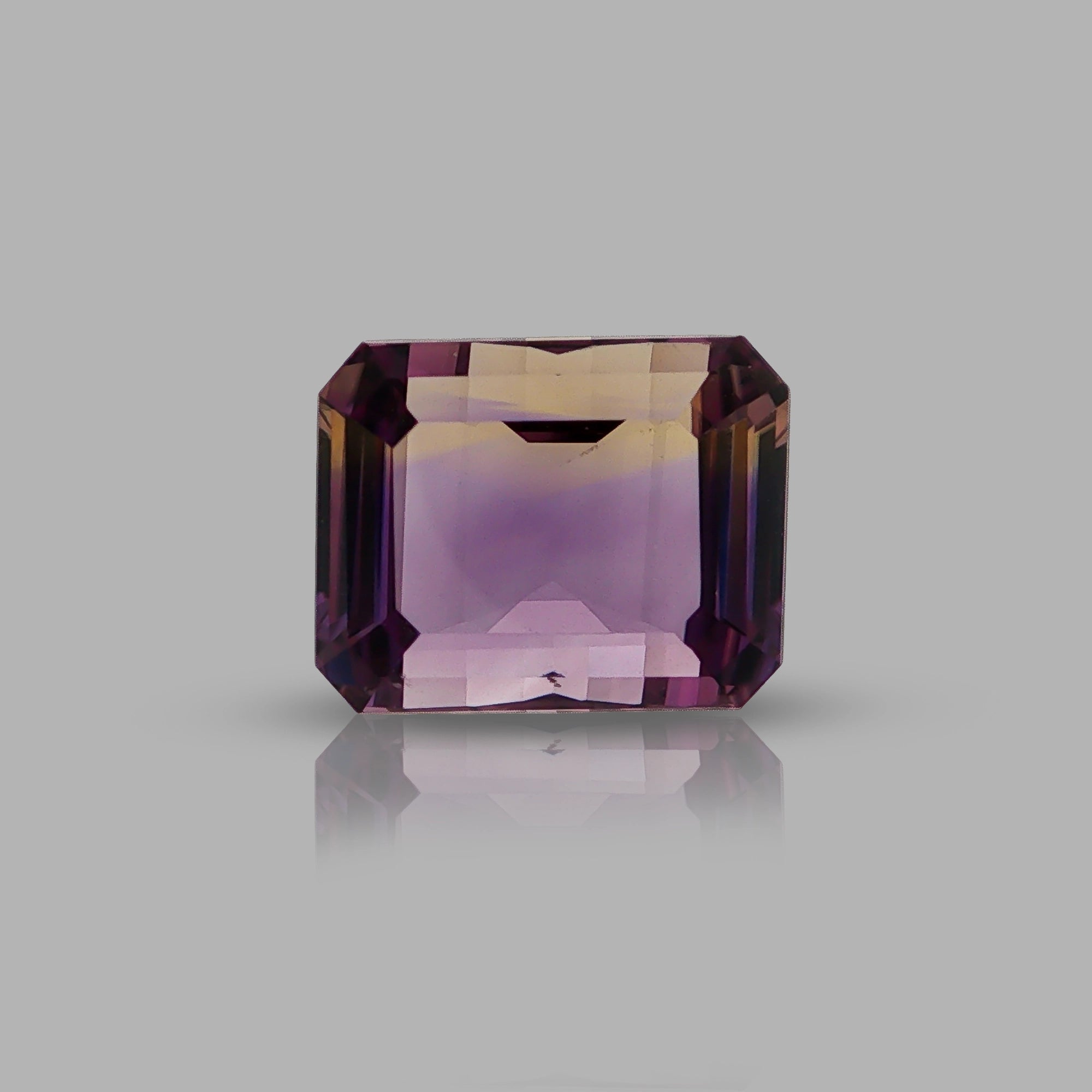 Natural ametrine, bicolor - purple / yellow, emerald cut, 10.98 ct, loose gemstone.