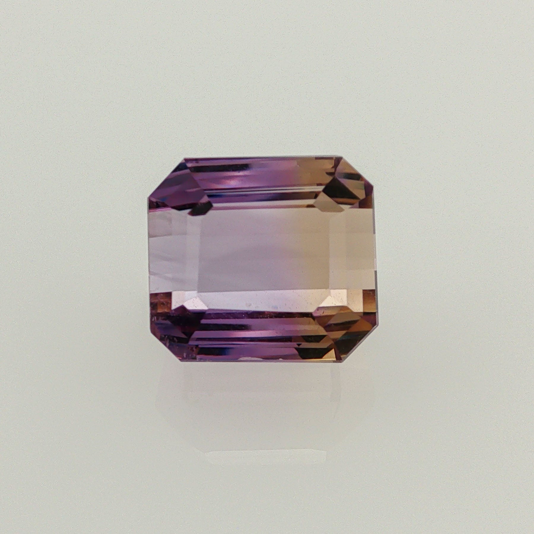 Natural ametrine, bicolor - purple / yellow, octagon cut, 11.44 ct, loose gemstone.