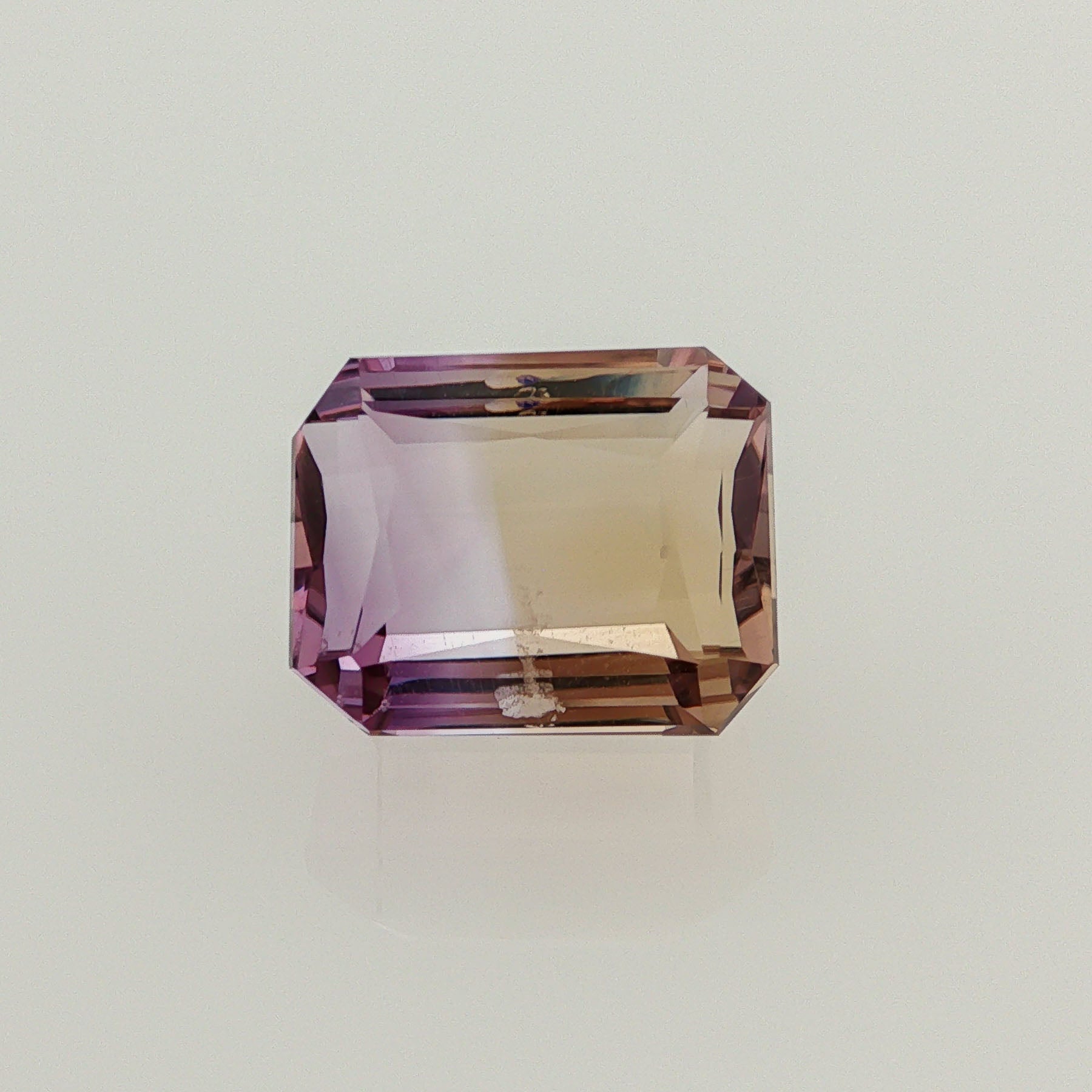 Natural ametrine, bicolor - purple / yellow, octagon cut, 11.68 ct, loose gemstone.