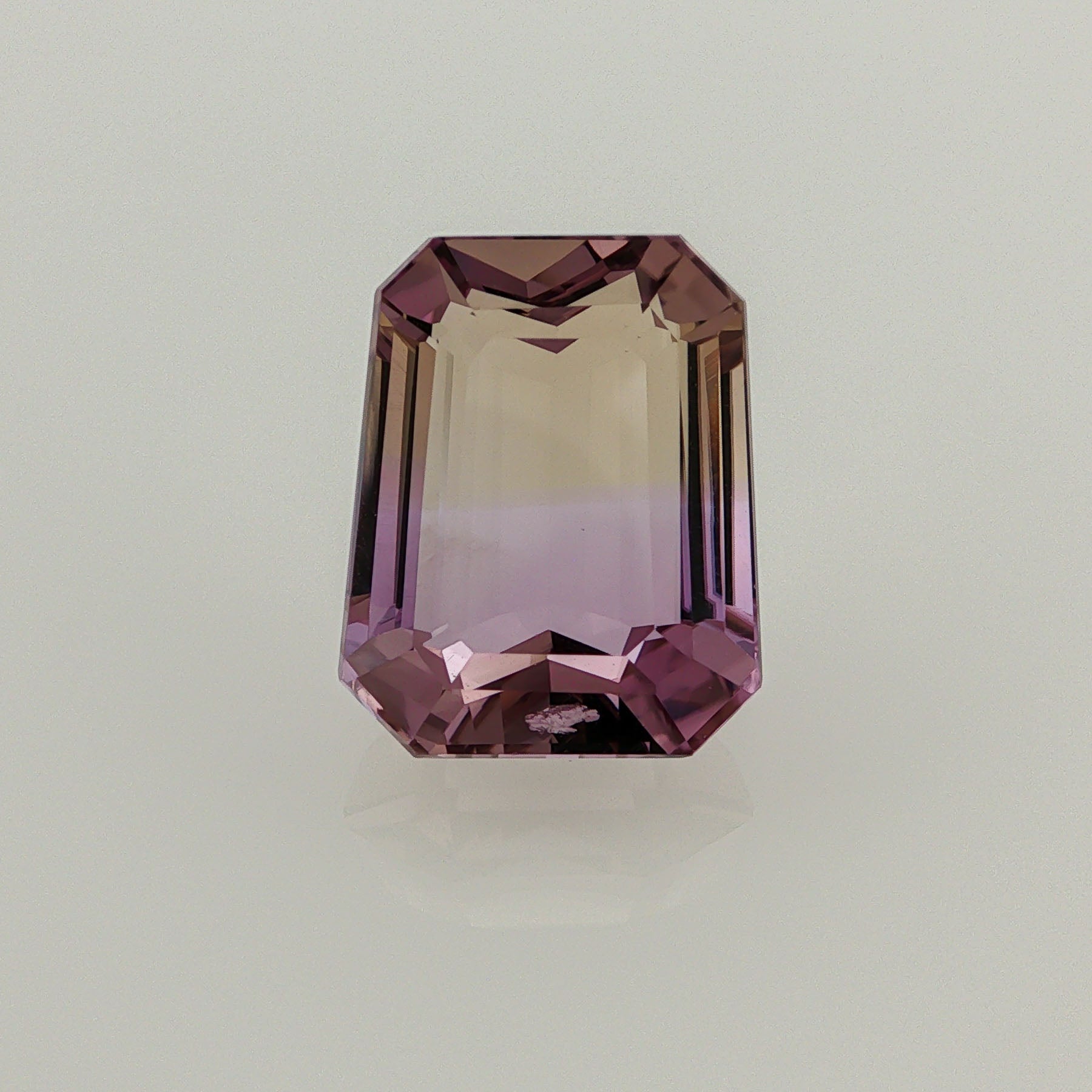 Natural ametrine, light purple / light yellow, octagon cut, 11.79 ct, loose gemstone.