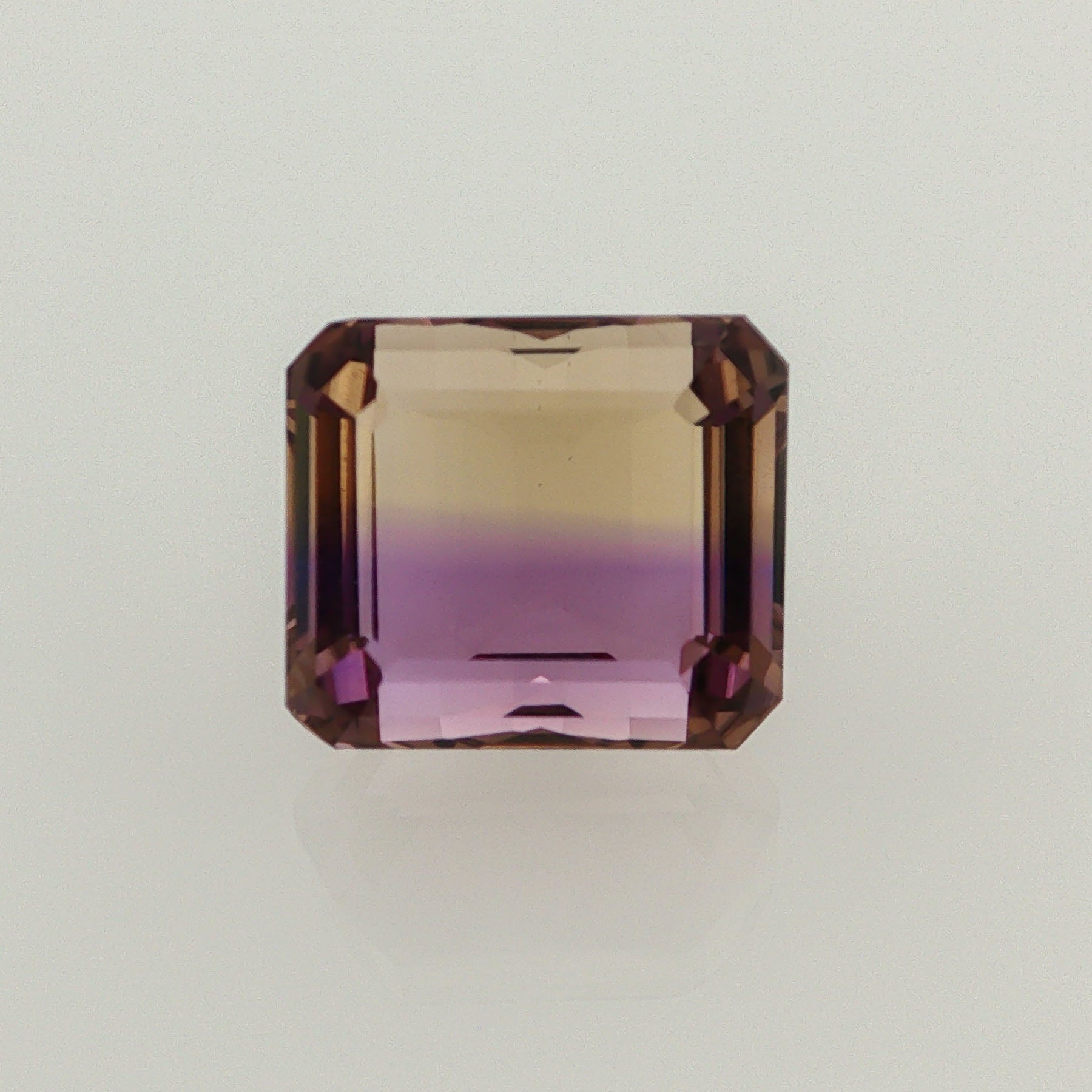 Natural ametrine, bicolor - vivid purple / vivid yellow, emerald cut, 11.93 ct, loose gemstone.