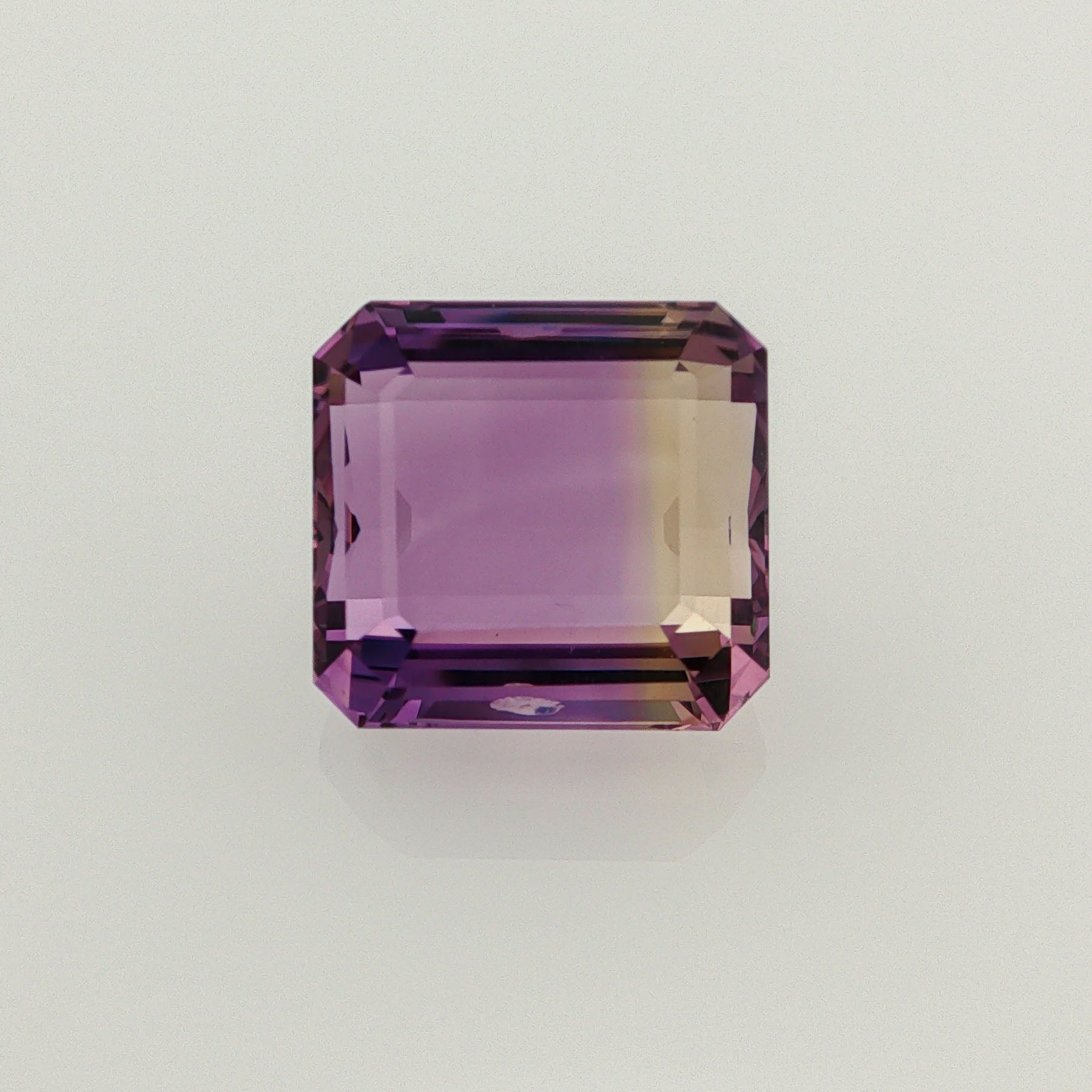Natural ametrine, bicolor - purple / yellow, octagon cut, 12.27 ct, loose gemstone.