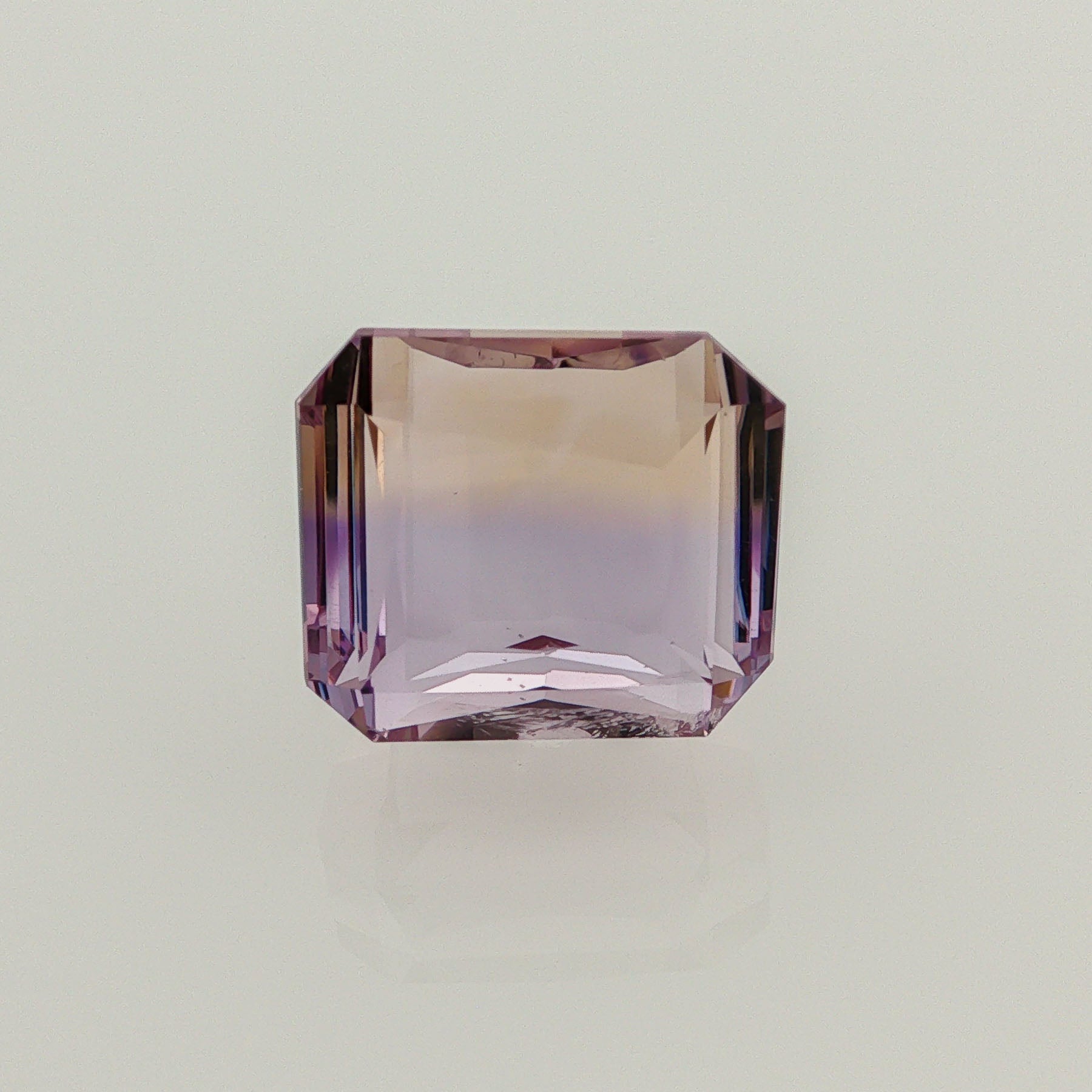 Natural ametrine, bicolor - purple / yellow, octagon cut, 12.32 ct, loose gemstone.