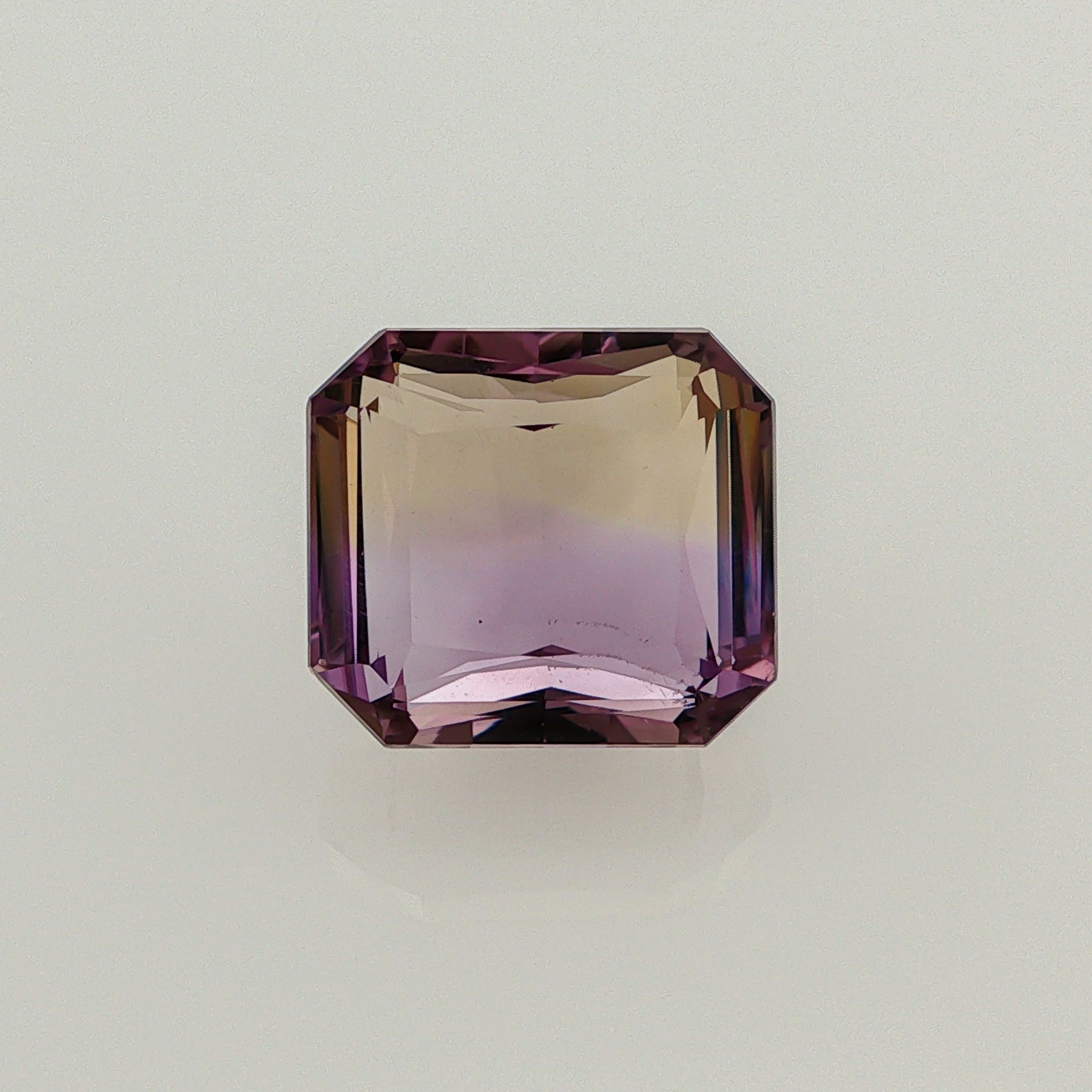 Natural ametrine, bicolor - purple / yellow, octagon cut, 12.33 ct, loose gemstone.