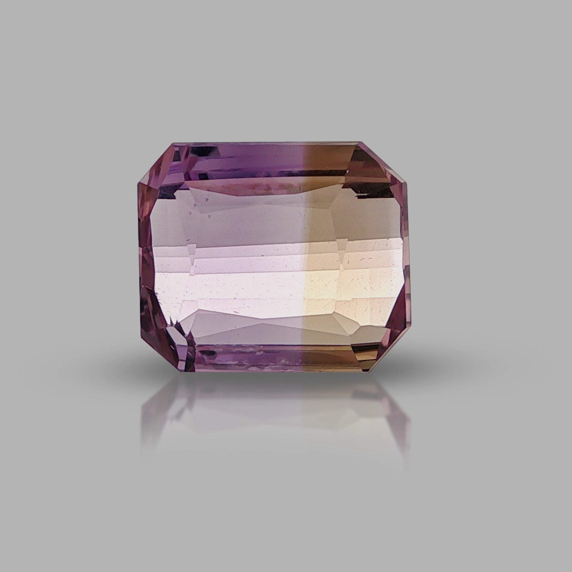 Natural ametrine, bicolor - purple / yellow, octagon cut, 12.36 ct, loose gemstone.